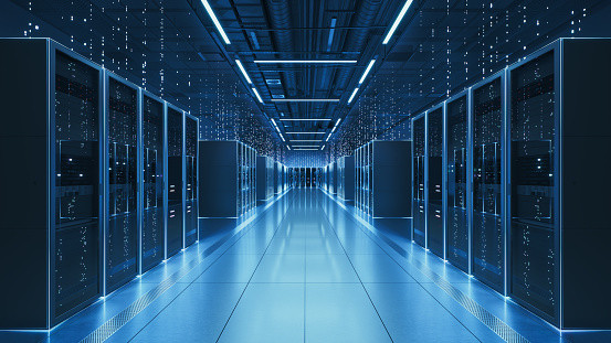 Interior view of a futuristic data center designed for artificial intelligence processing, featuring glowing servers and digital data streams. (photo: imaginima / Getty Images)