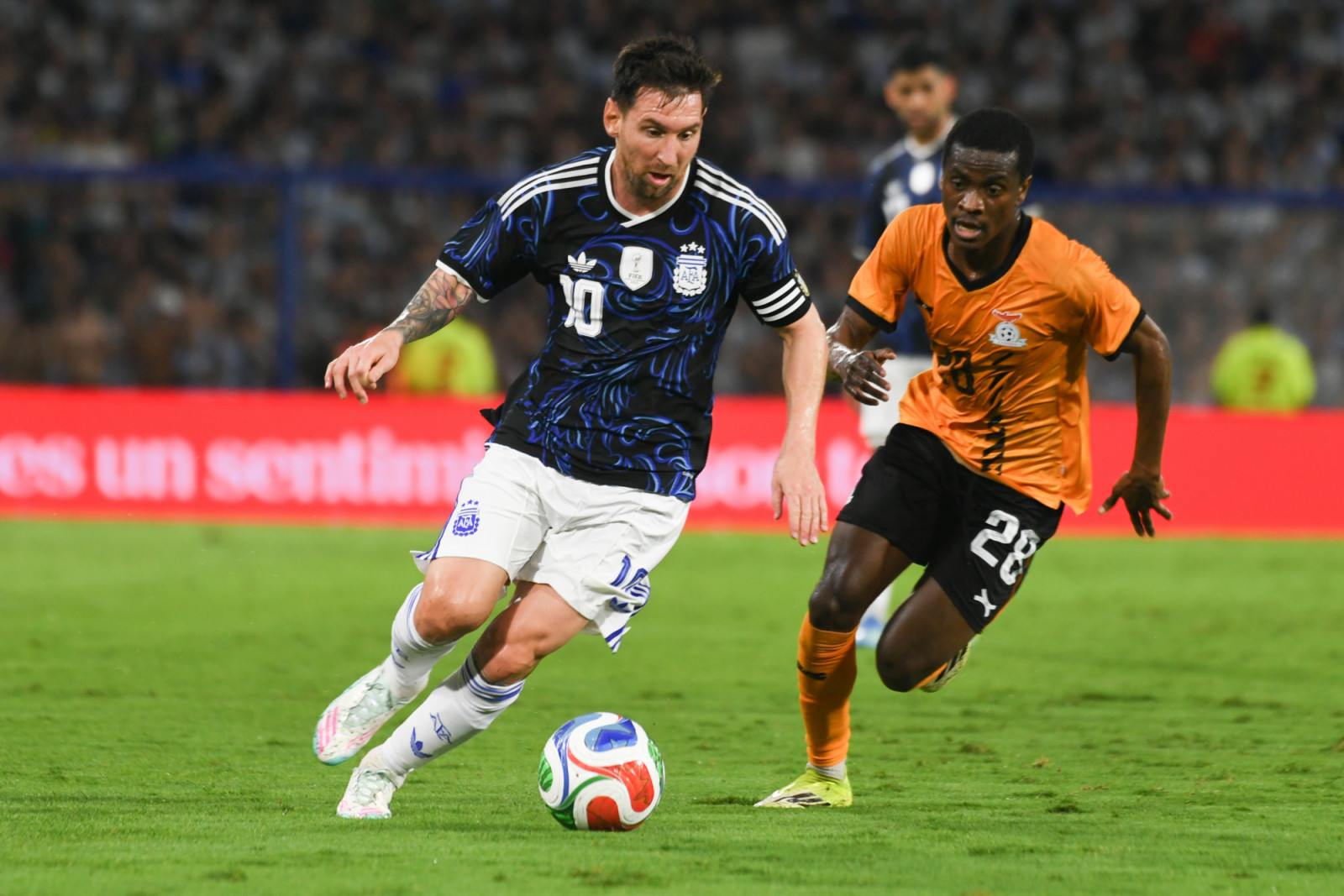 Lionel Messi dodges an opponent during a friendly match against Zambia at La Bombonera in Buenos Aires, Argentina, on March 31, 2026, ahead of the FIFA 2026 World Cup. (Photo by Pablo Elias/NurPhoto via Getty Images)