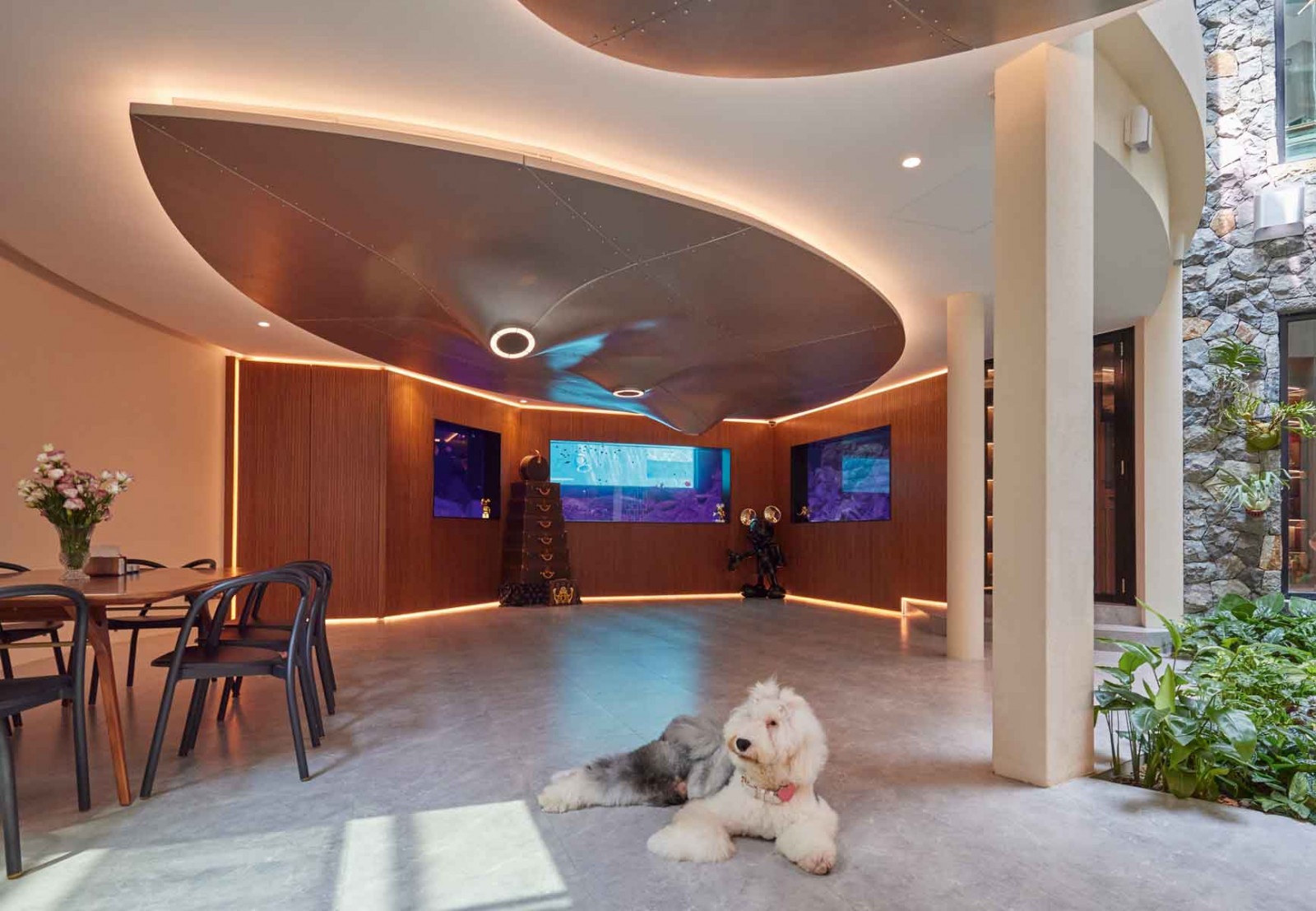 The multipurpose family hall showcases the Cow Udder installation and a dramatic fish tank