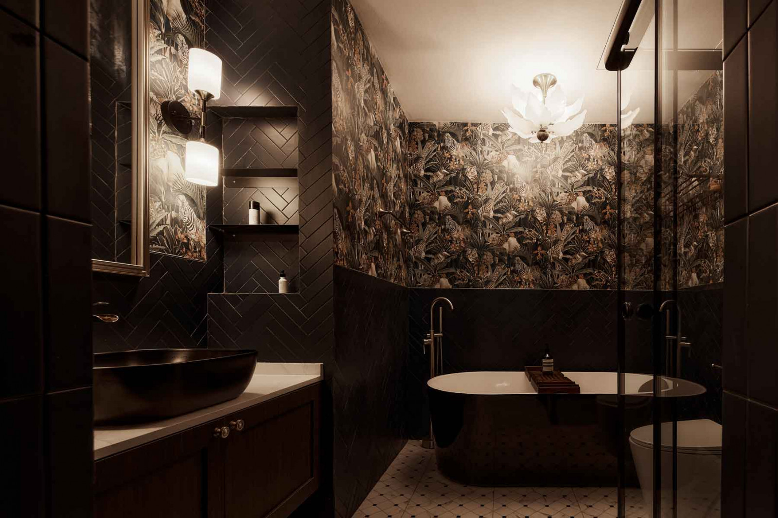 Soft lighting imbues this bathroom with a sultry air