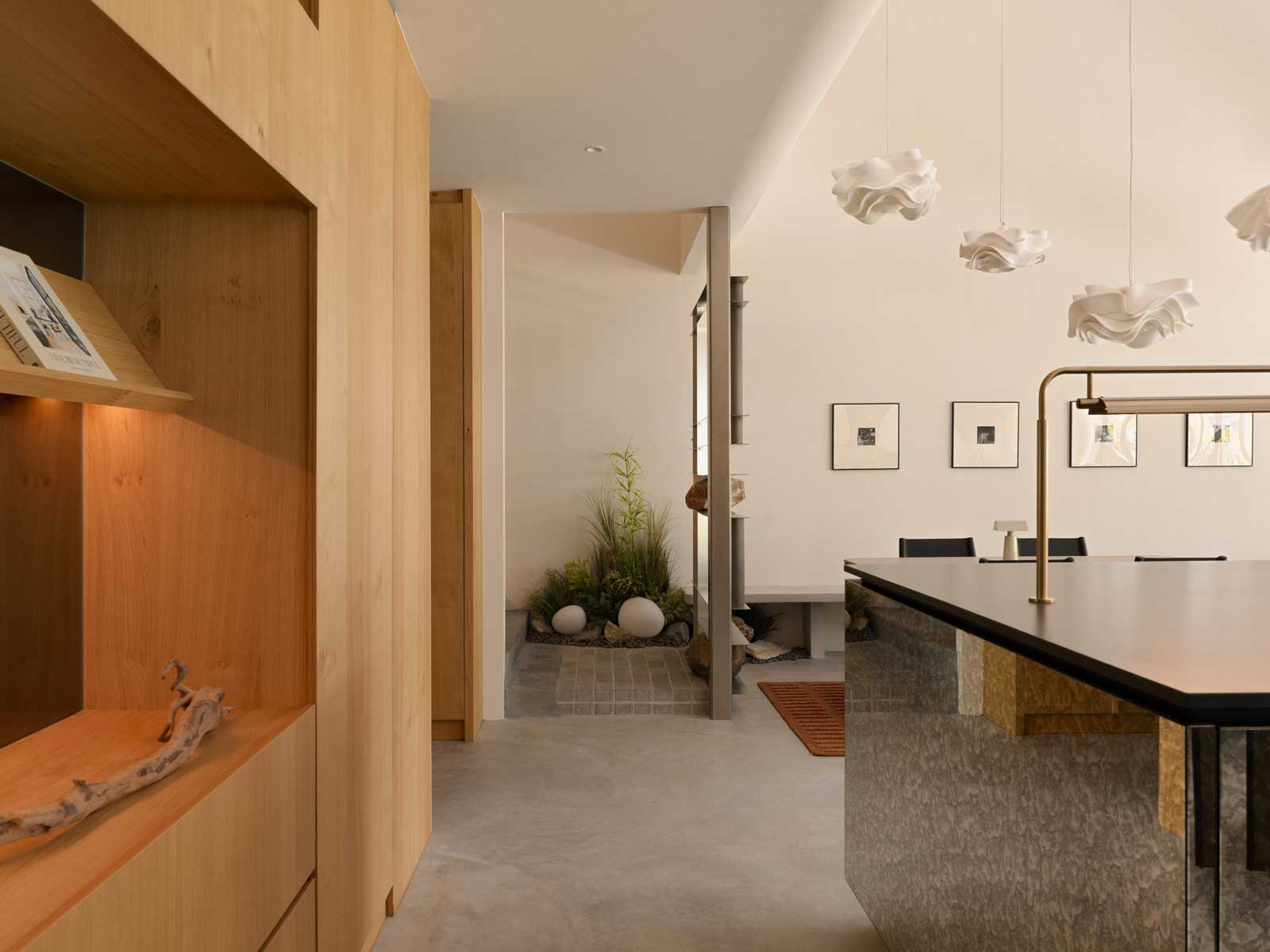 These fluffy Kelopak pendant lamps by Ong Cen Kuang set a whimsical tone near the entrance