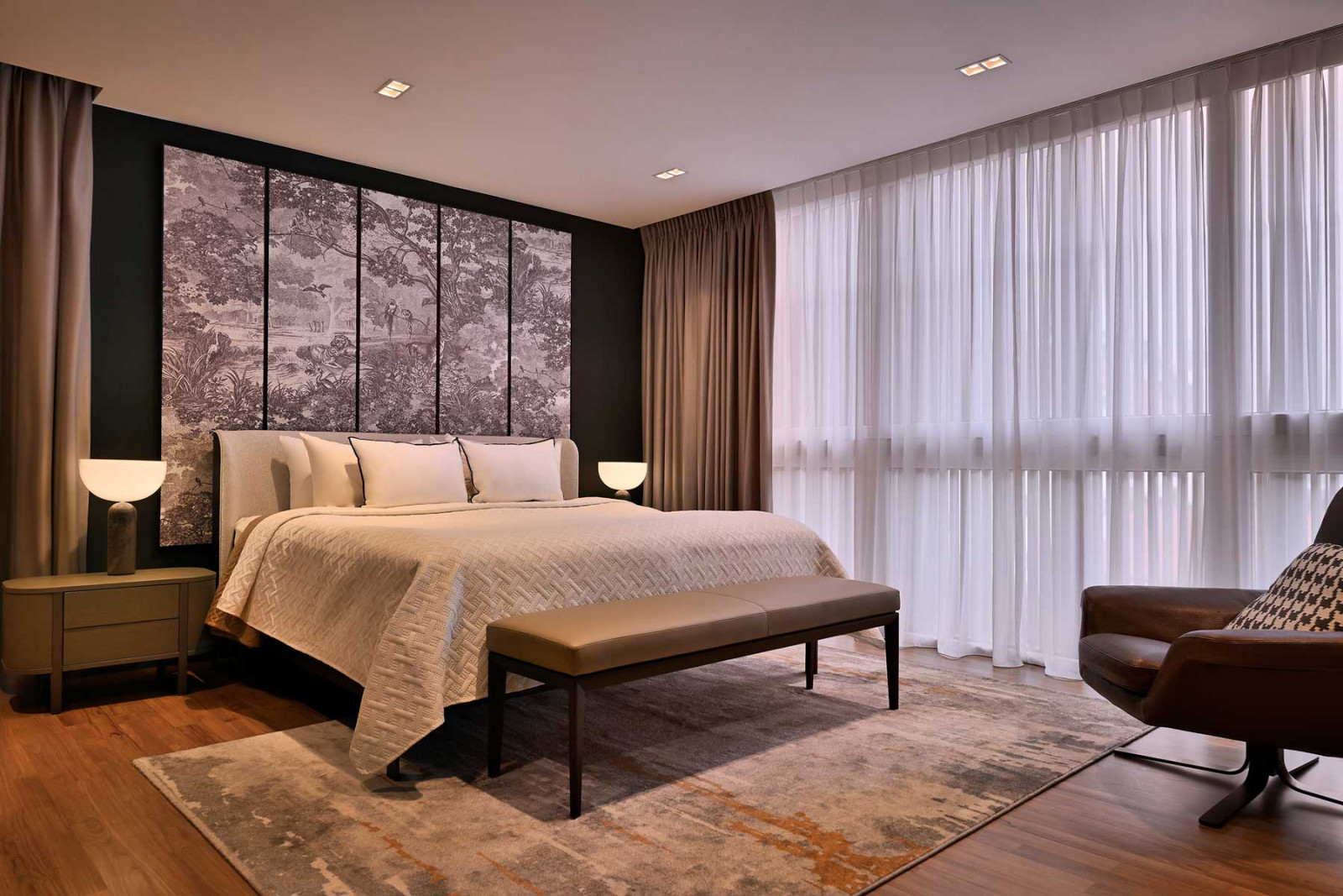 Decorative toile de jouy-inspired screens lend personality to the master suite