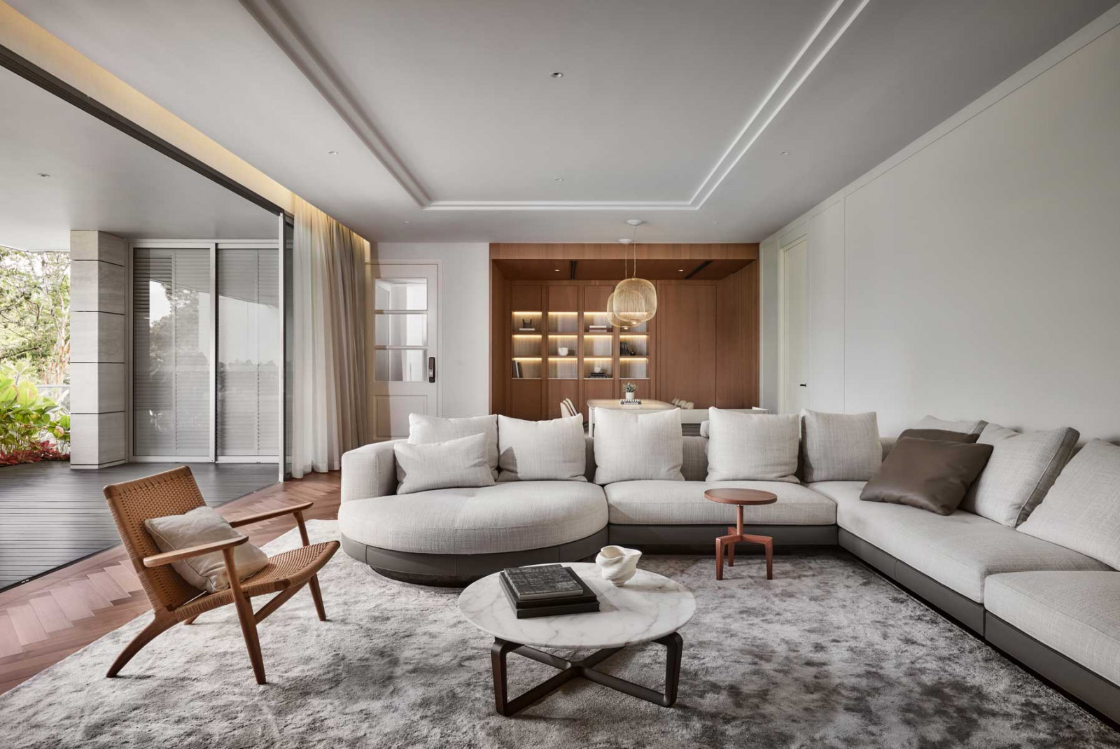The living room features a timber-finish nook that adds depth and character