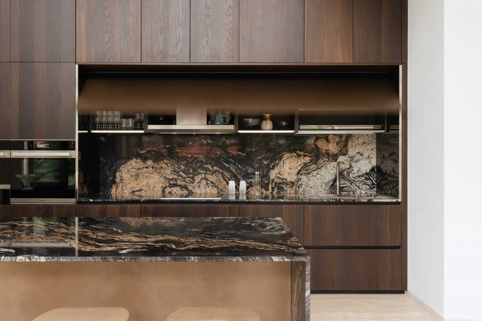 Cosentino Sensa Orinoco granite countertops make a luxurious statement in the kitchen