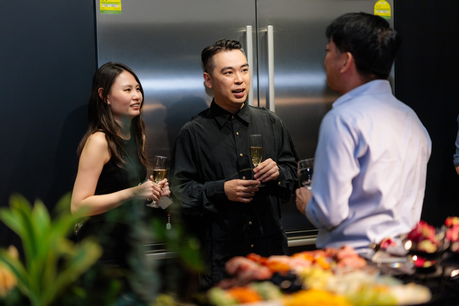 Rix Yap and Lee Foong speaking with Kenneth Goh