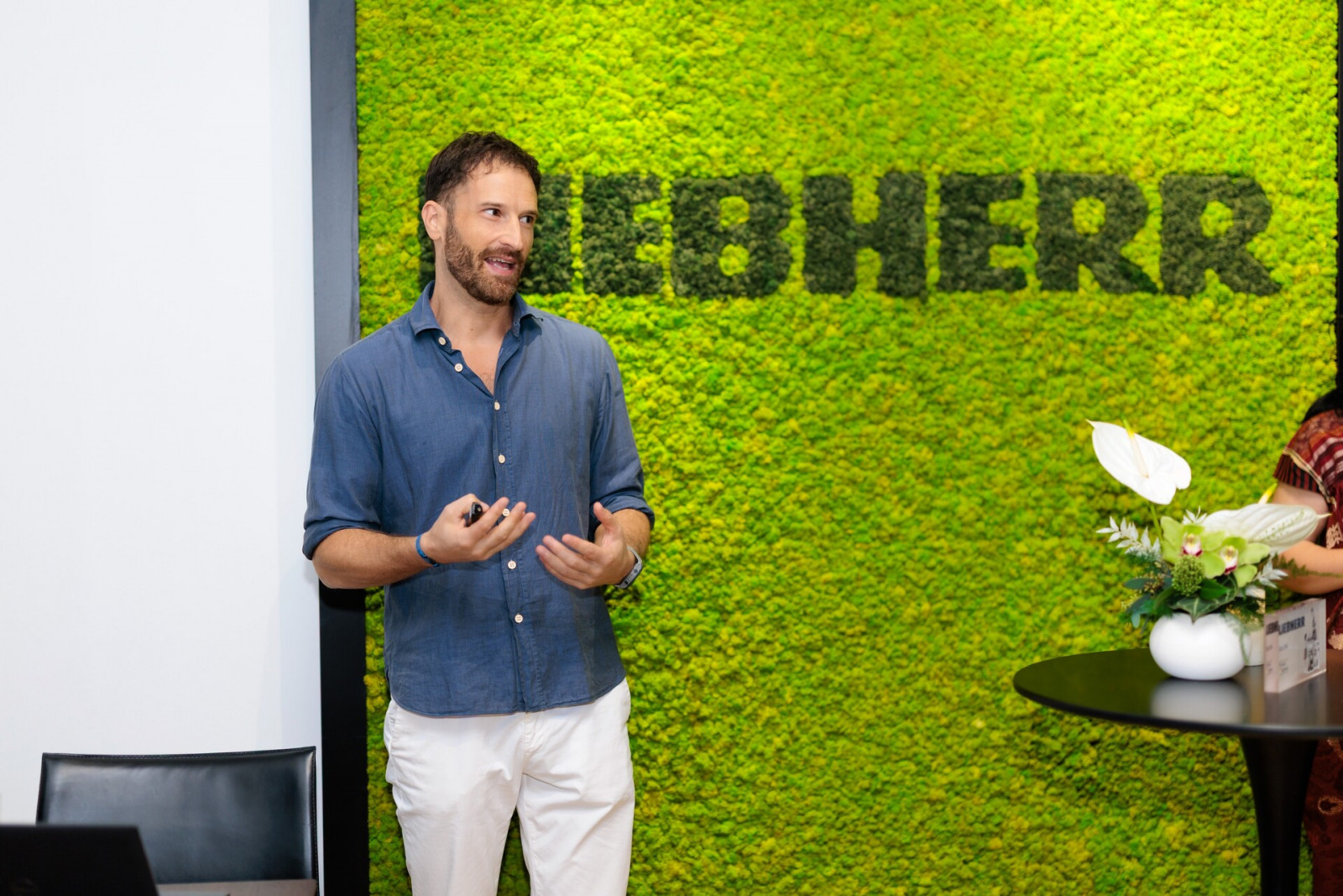 Gian Paolo Glueckler walking guests through the brand’s story