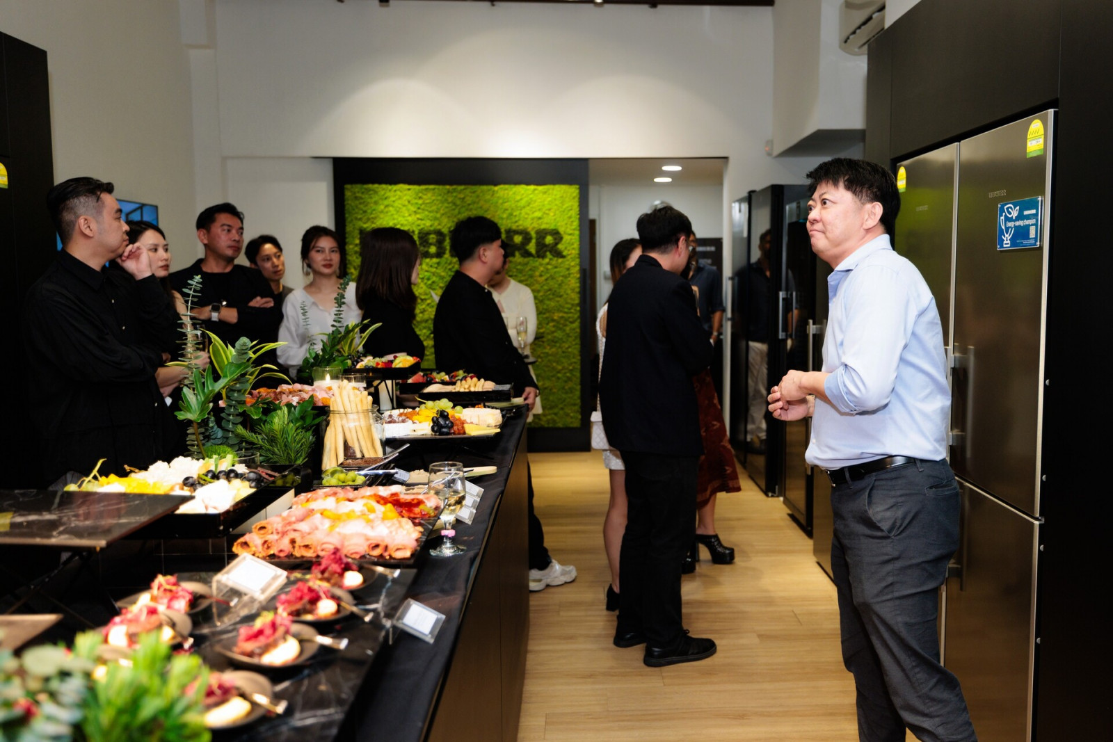 Kenneth Goh giving a punchy presentation of the German-Swiss brand’s sleek and innovative refrigerators