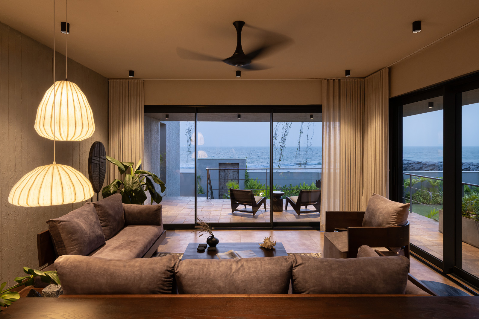 Twilight views of the outdoors in a Karnataka, India home designed by Thomas Parambil Architects
