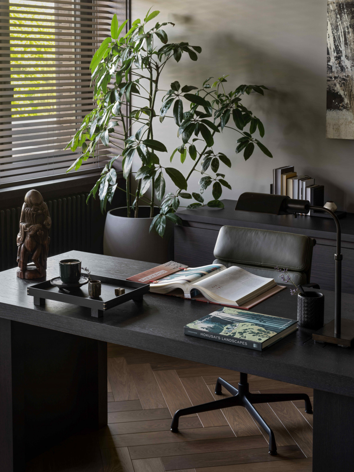 The home’s symmetrical and axial logic transition into more intimate quarters