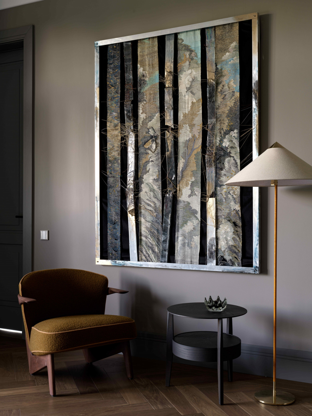 The handwoven tapestry by Sergey Gavin, made of brocade, gold threads, and glass details
