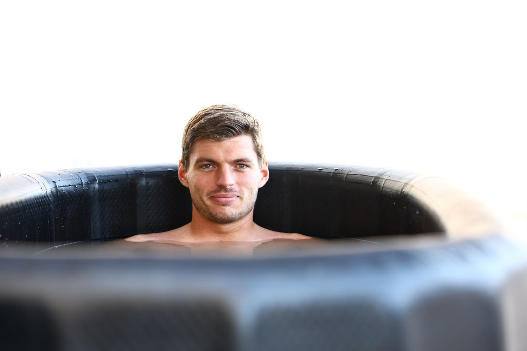 LUSAIL CITY, QATAR - OCTOBER 06: Max Verstappen of the Netherlands and Oracle Red Bull Racing takes an ice bath prior to practice ahead of the F1 Grand Prix of Qatar at Lusail International Circuit on October 06, 2023 in Lusail City, Qatar. (Photo by Mark Thompson/Getty Images)