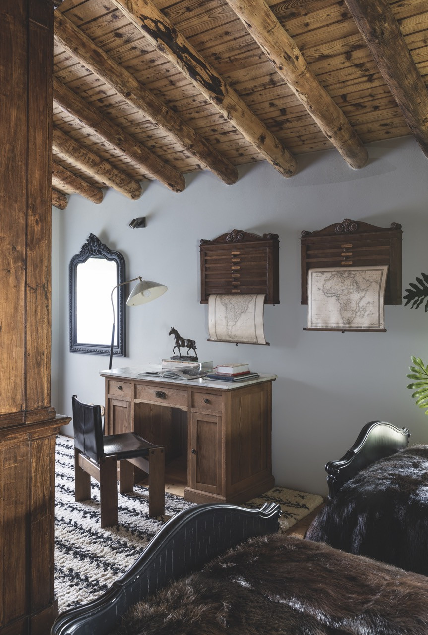 This bedroom study features Afra and Tobia Scarpa’s Monk chair for Molteni