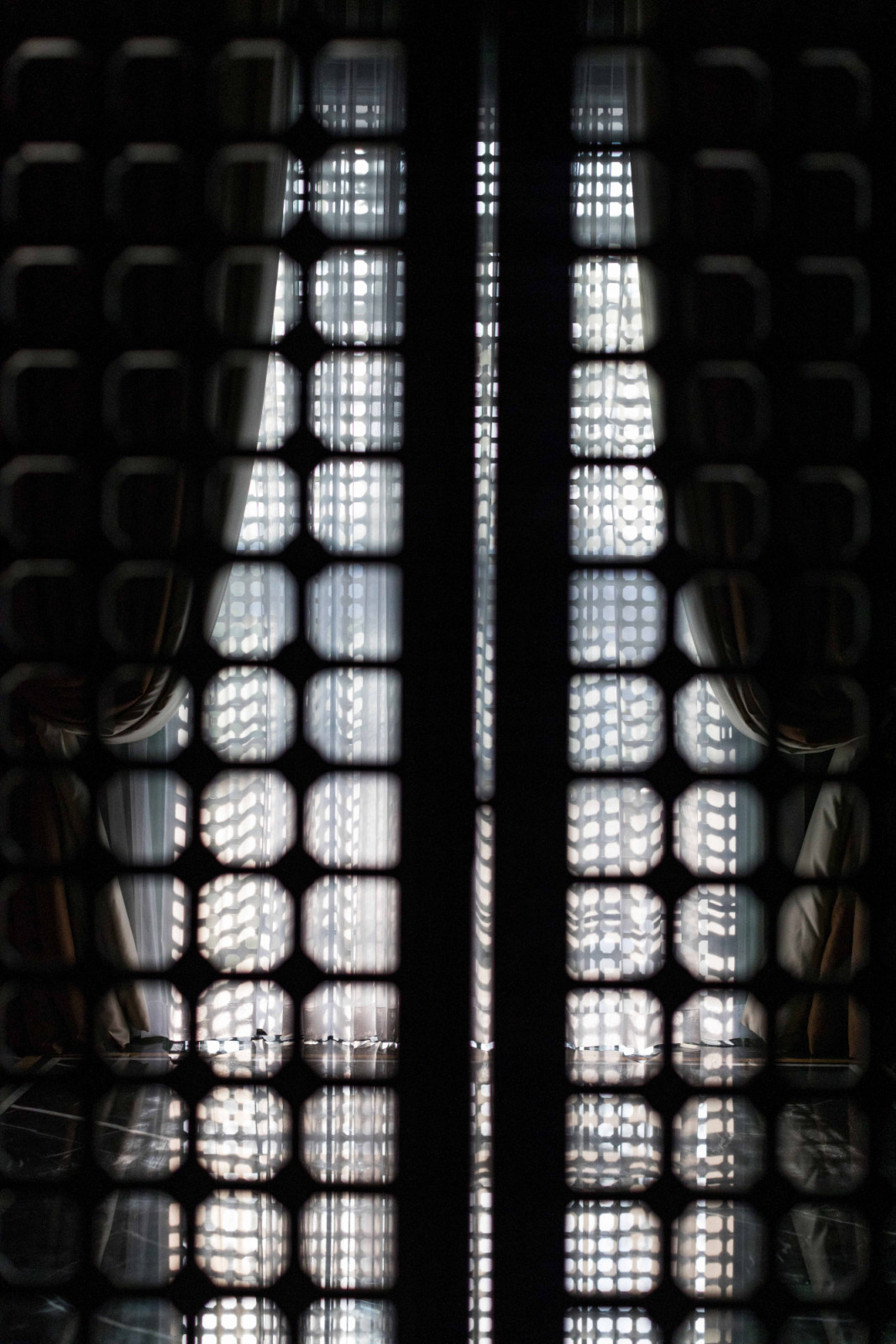 A silhouetted foyer screen creates a poetic moment at The Continental
