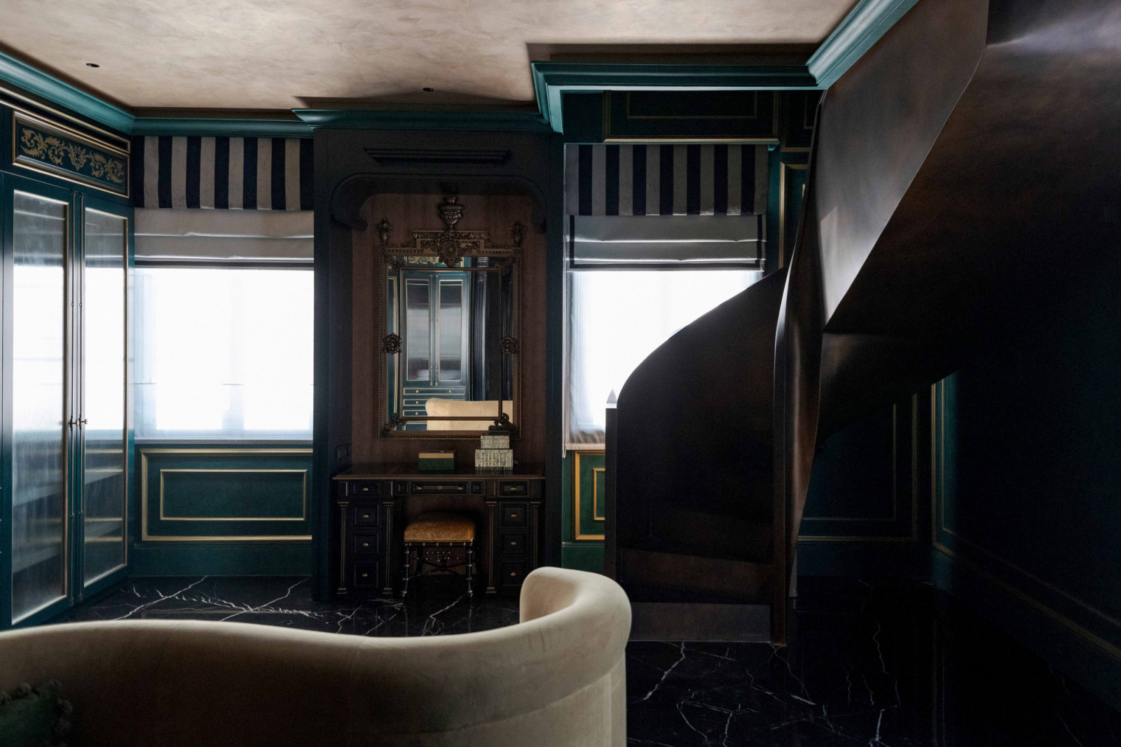 A dark, glossy marble floor at The Continental lends a sense of mystery, echoing the John Wick universe
