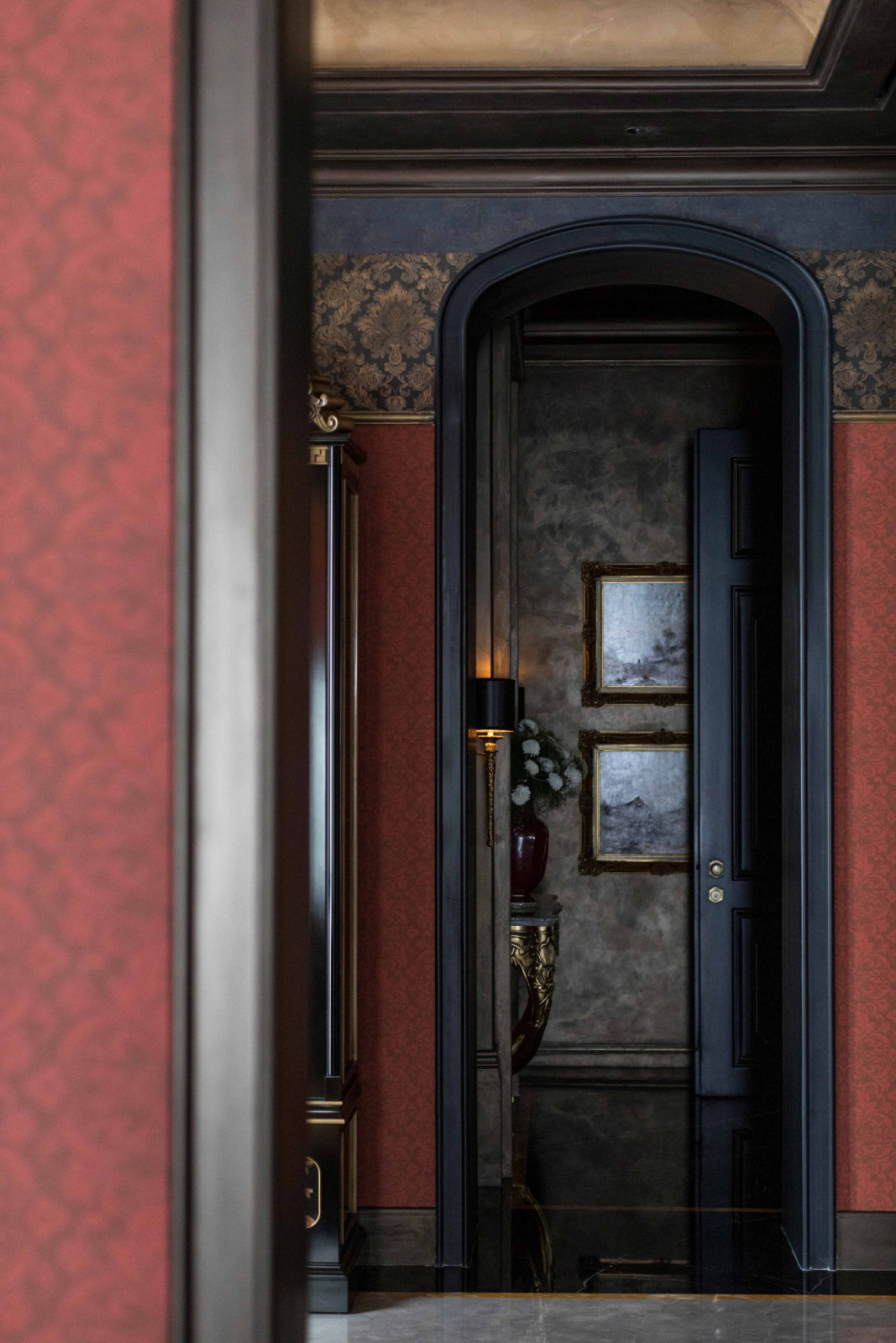 A series of doorways frames a layered view through the house