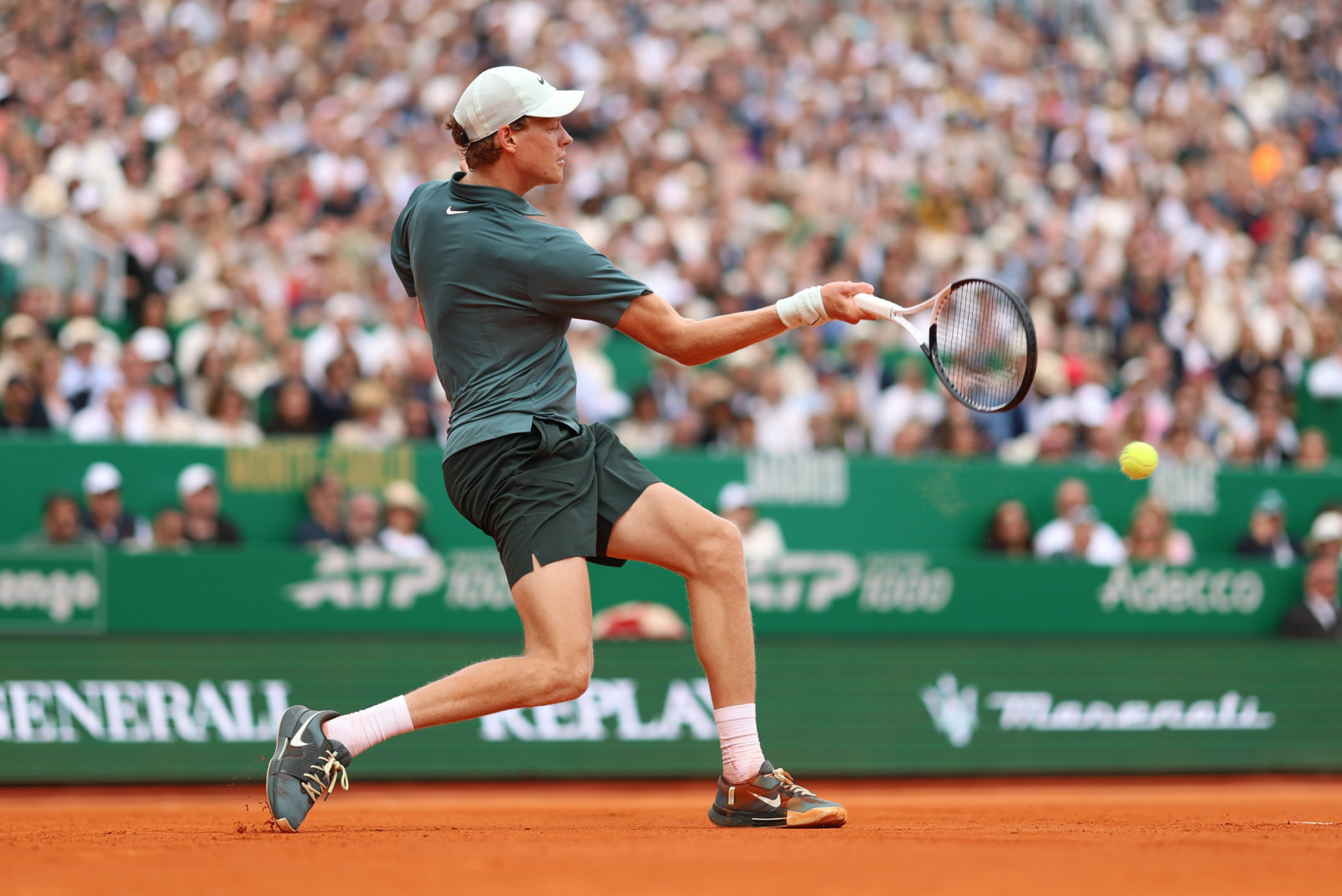 MONTE-CARLO, MONACO - APRIL 12: Jannik Sinner of Italy plays a forehand against Carlos Alcaraz of Spain during the Men's Singles Final during day eight of the Rolex Monte-Carlo Masters at Monte-Carlo Country Club on April 12, 2026 in Monte-Carlo, Monaco. (Photo by Julian Finney/Getty Images)