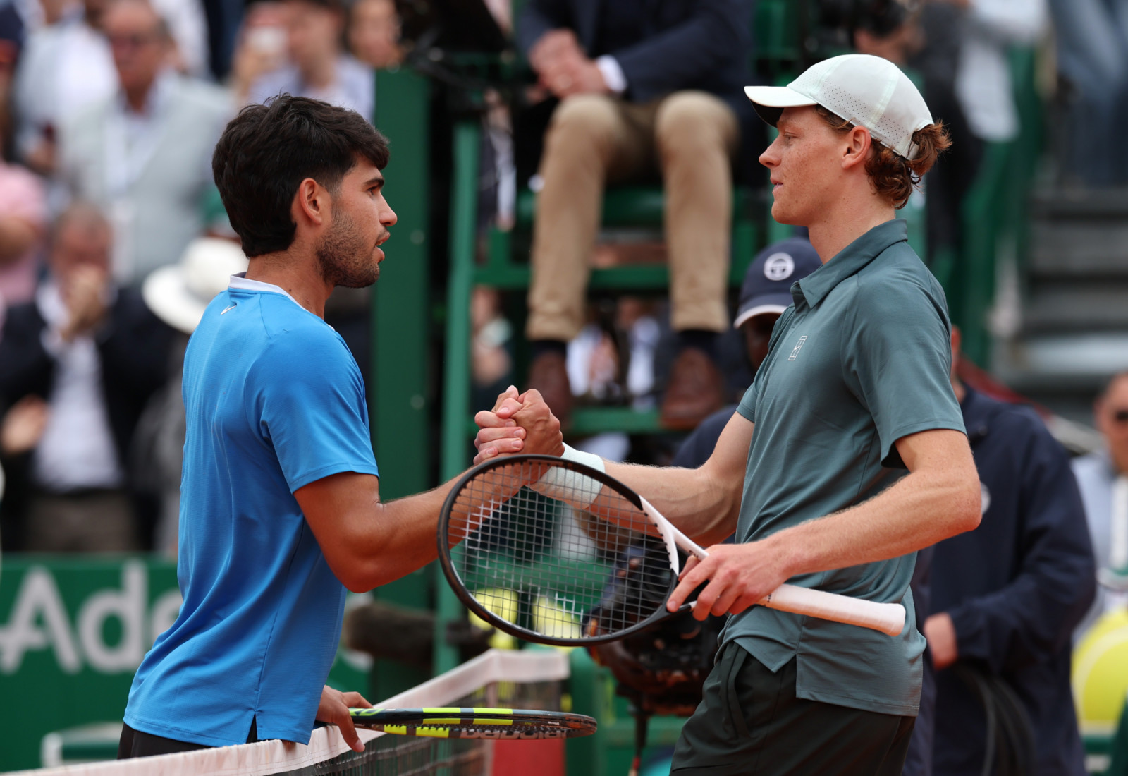 MONTE-CARLO, MONACO - APRIL 12: Jannik Sinner of Italy shakes hands with Carlos Alcaraz of Spain after victory in the Men's Singles Final during day eight of the Rolex Monte-Carlo Masters at Monte-Carlo Country Club on April 12, 2026 in Monte-Carlo, Monaco. (Photo by Julian Finney/Getty Images)