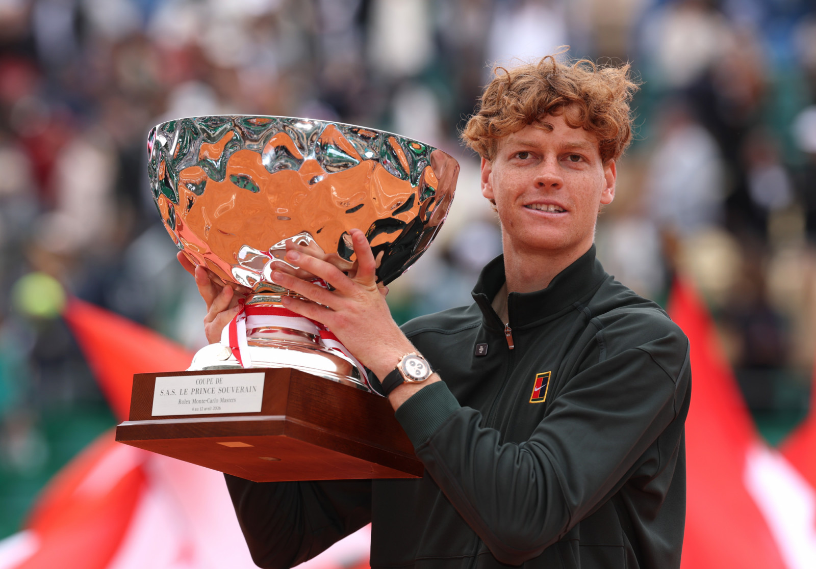 MONTE-CARLO, MONACO - APRIL 12: Jannik Sinner of Italy celebrates with his winners trophy after victory against Carlos Alcaraz of Spain during the Men's Singles Final during day eight of the Rolex Monte-Carlo Masters at Monte-Carlo Country Club on April 12, 2026 in Monte-Carlo, Monaco. (Photo by Julian Finney/Getty Images)