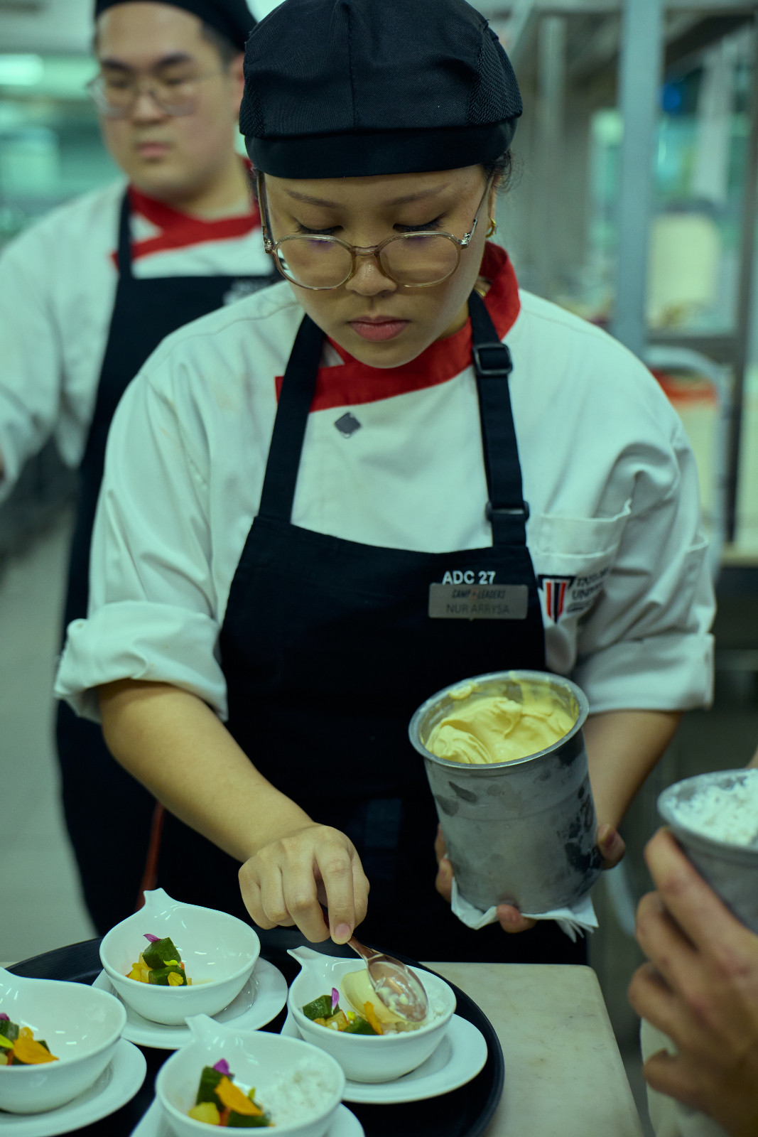 COL participant Nur Arrysa preparing dessert