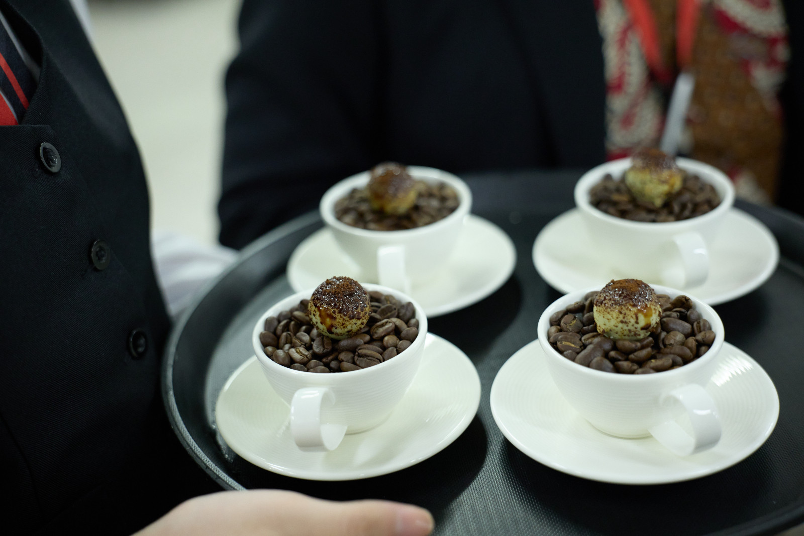 Petit Fours prepared under Chef Hans guidance: Coffee “Explosion” with a Liquid-Centered Coffee Bonbon