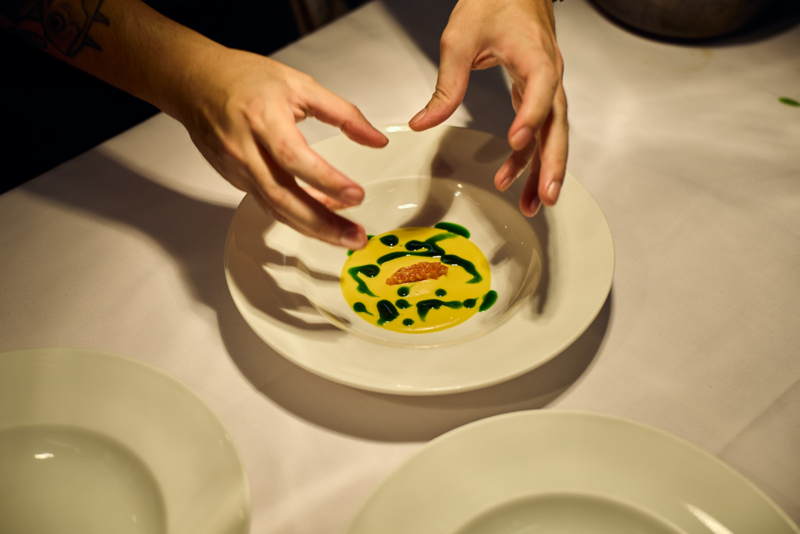 Explaining the perfect flourish for the main course presentation