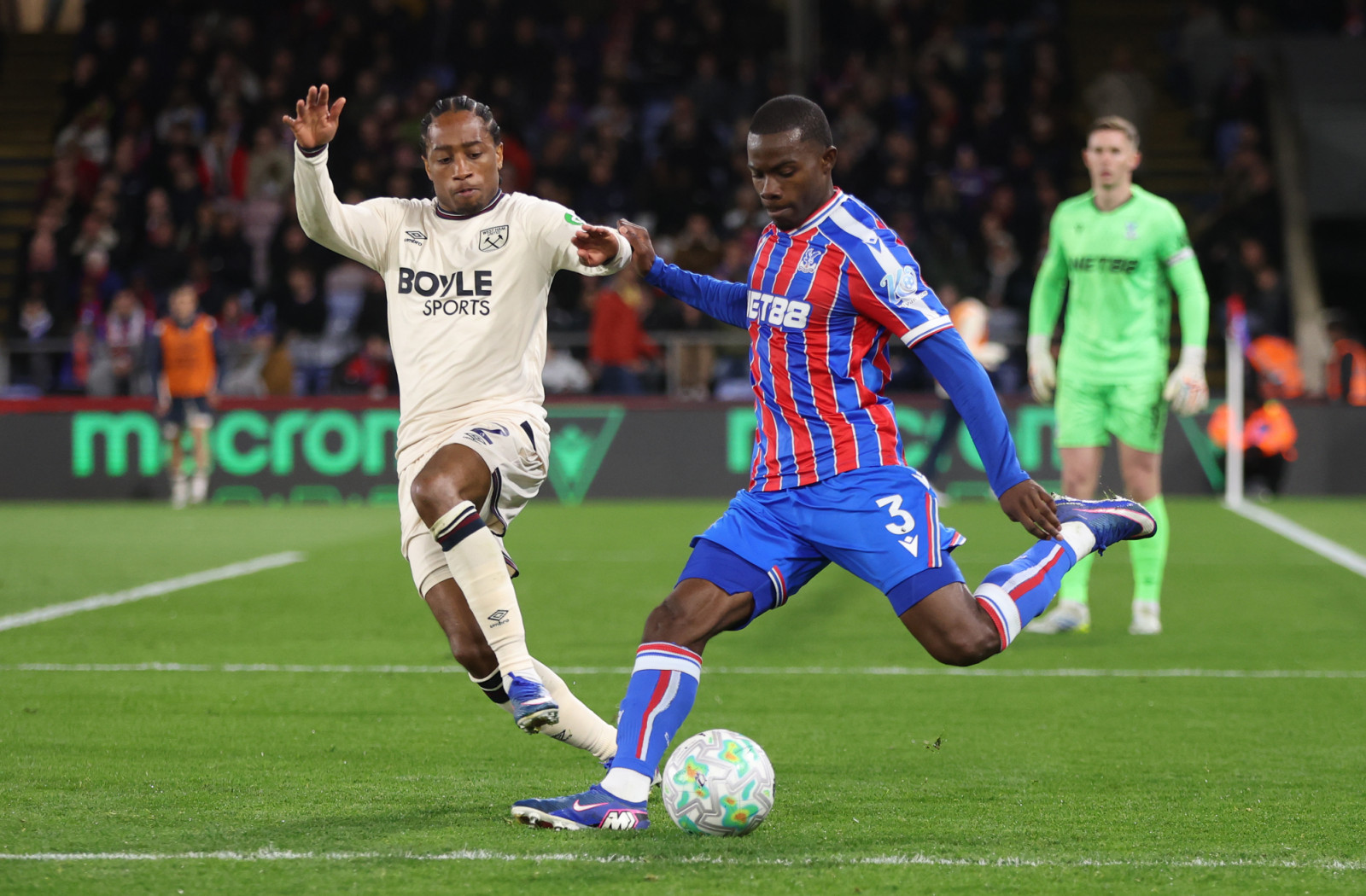 LONDON, ENGLAND - APRIL 20: Crystal Palace's Tyrick Mitchell and West Ham United's Kyle Walker-Peters during the Premier League match between Crystal Palace and West Ham United at Selhurst Park on April 20, 2026 in London, United Kingdom. (Photo by Rob Newell - CameraSport via Getty Images)