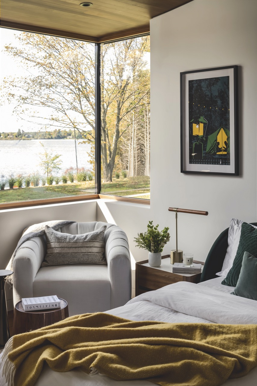This corner bedroom window frames scenic views of Eugenia Lake