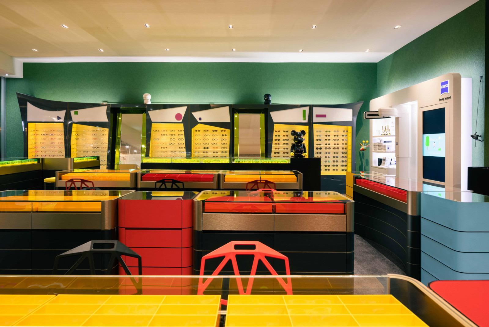 Vibrant hues and playful wall patterns serve as a dynamic canvas that highlights spectacle frames, making the merchandise pop