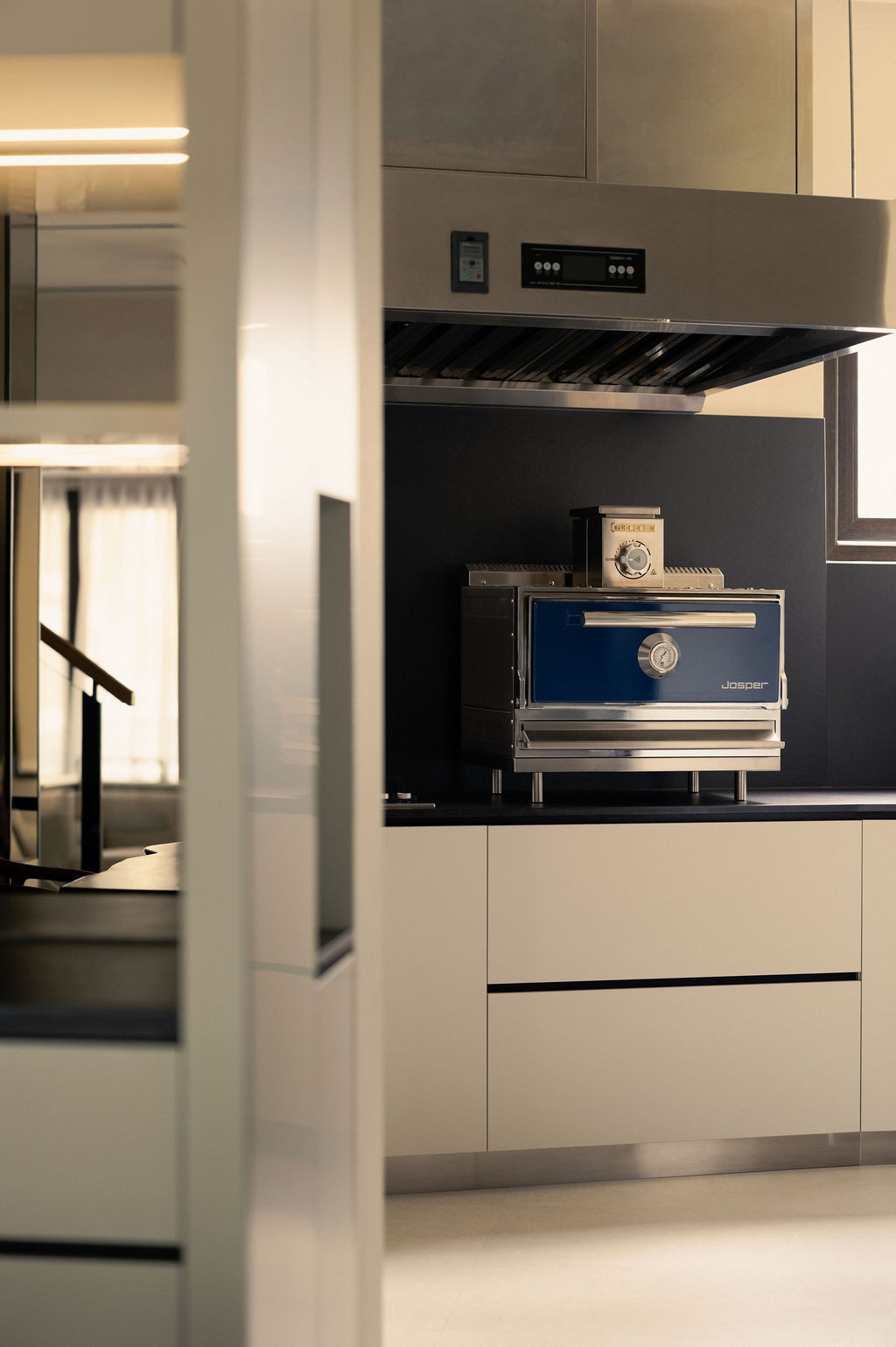 A Josper oven sits proudly in the sleek, moden kitchen