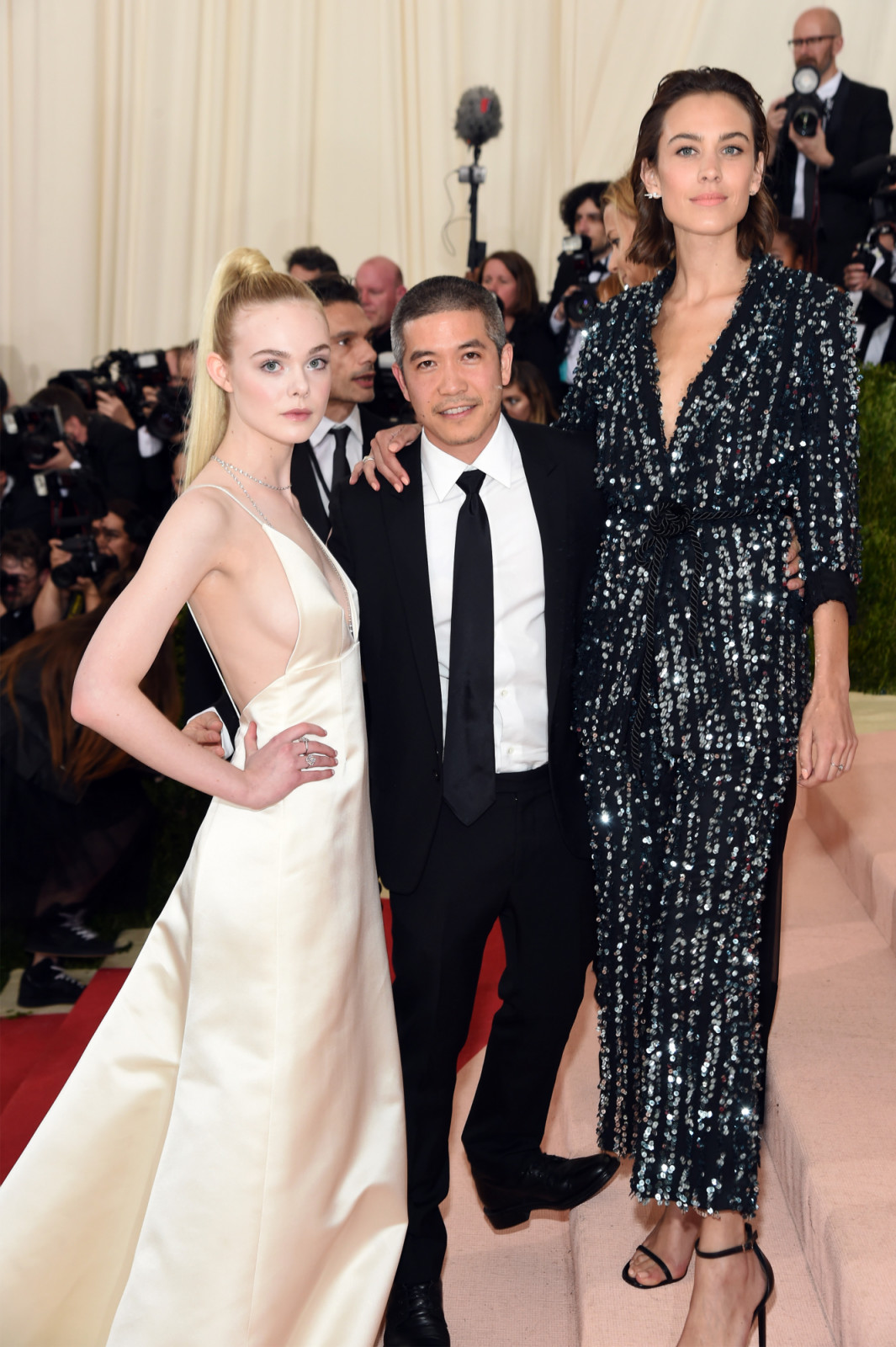 NEW YORK, NY - MAY 02: Elle Fanning, Thakoon Panichgul, and Alexa Chung attend the "Manus x Machina: Fashion In An Age Of Technology" Costume Institute Gala at Metropolitan Museum of Art on May 2, 2016 in New York City. (Photo by Jamie McCarthy/FilmMagic)