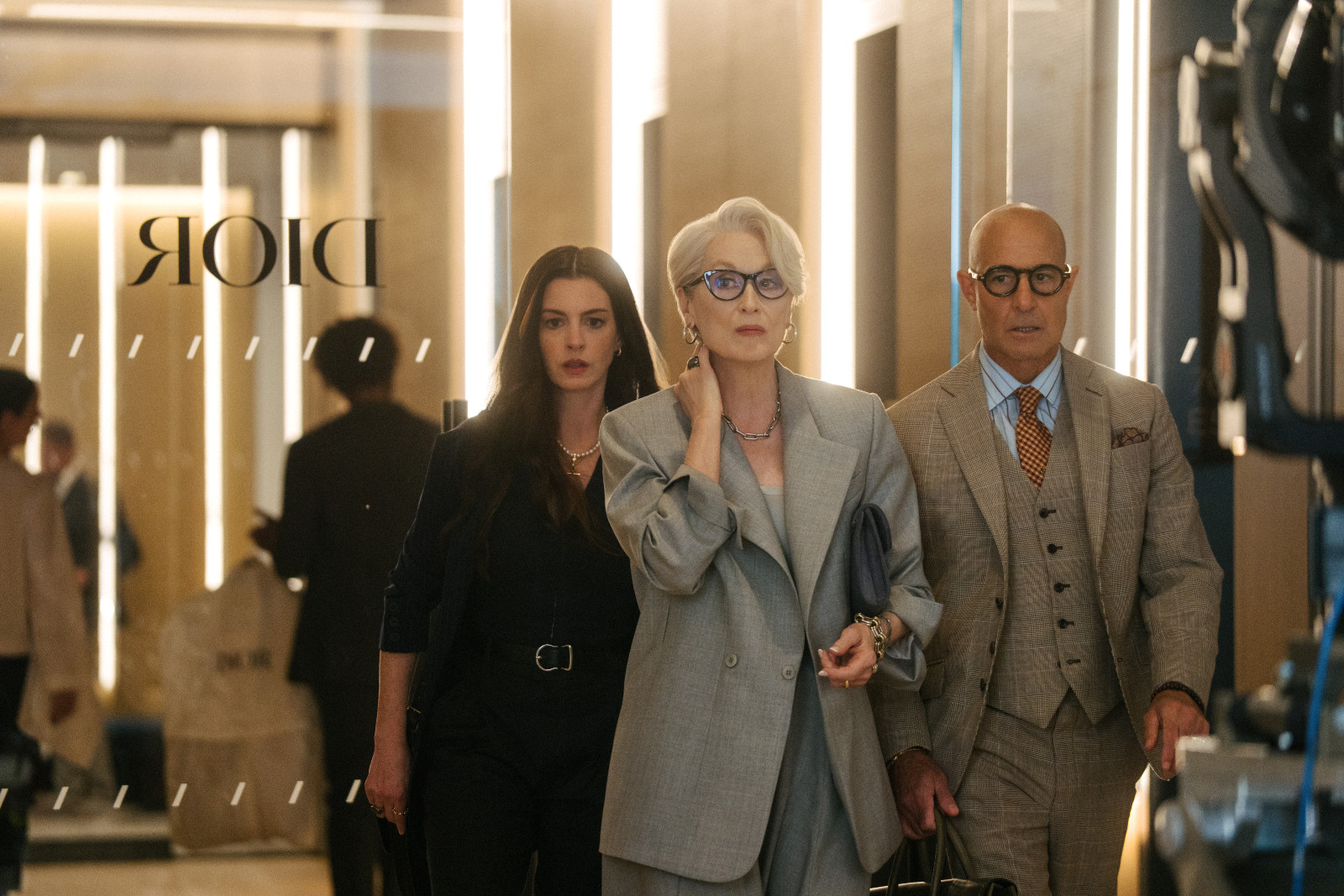 (L-R) Anne Hathaway as Andy Sachs, Meryl Streep as Miranda Priestly and Stanley Tucci as Nigel Kipling in 20th Century Studios' THE DEVIL WEARS PRADA 2. Photo by Macall Polay. © 2026 20th Century Studios. All Rights Reserved.