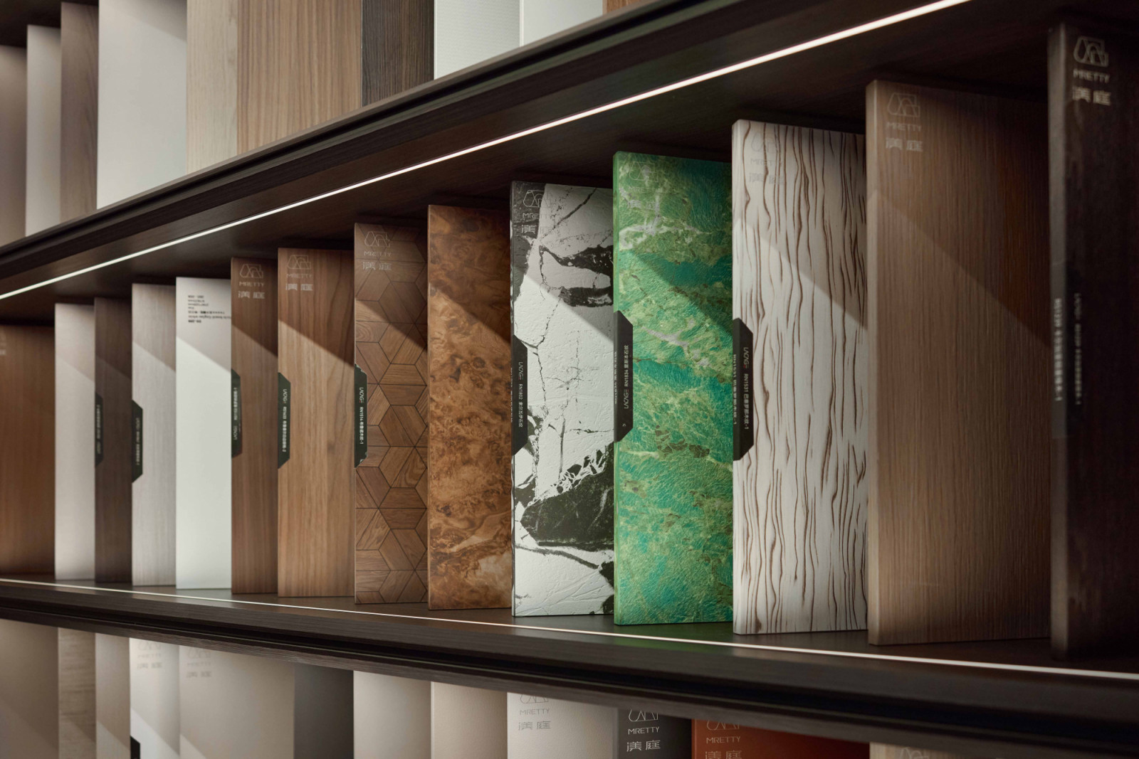 In the Mretty Singapore showroom, the material library showcases an extensive range of finishes, allowing clients to assess texture, tone and detail firsthand