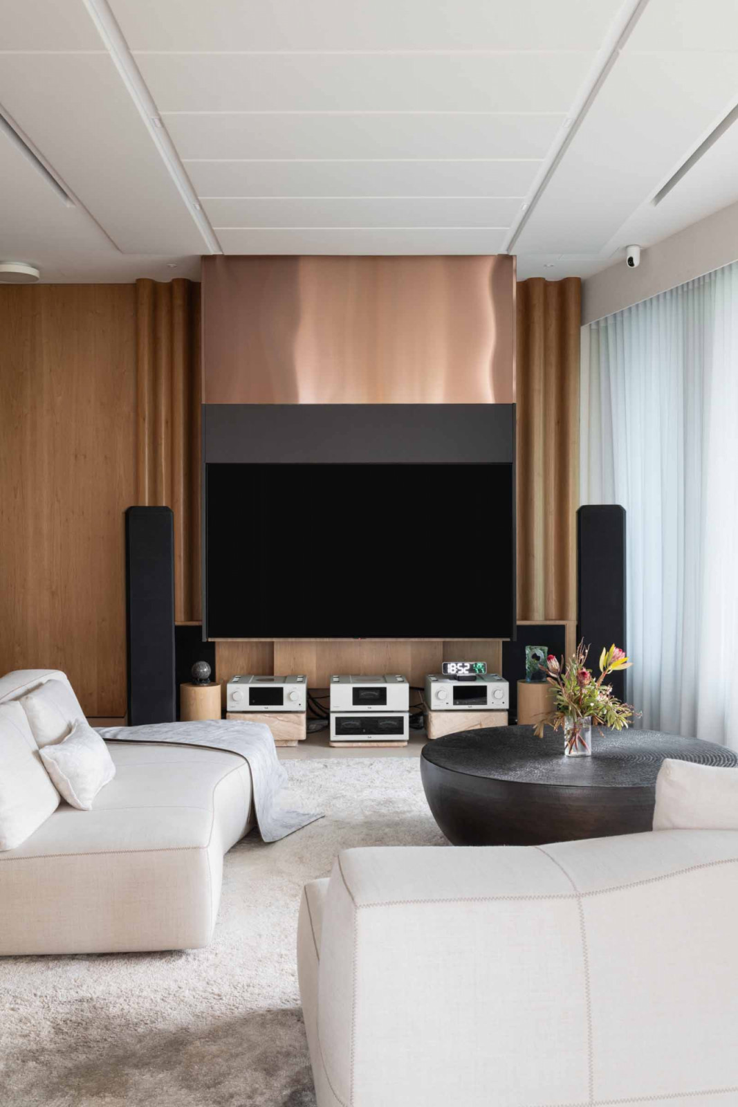 The owner’s hi-fi and home theatre set-up takes centre stage in the living room entertainment corner