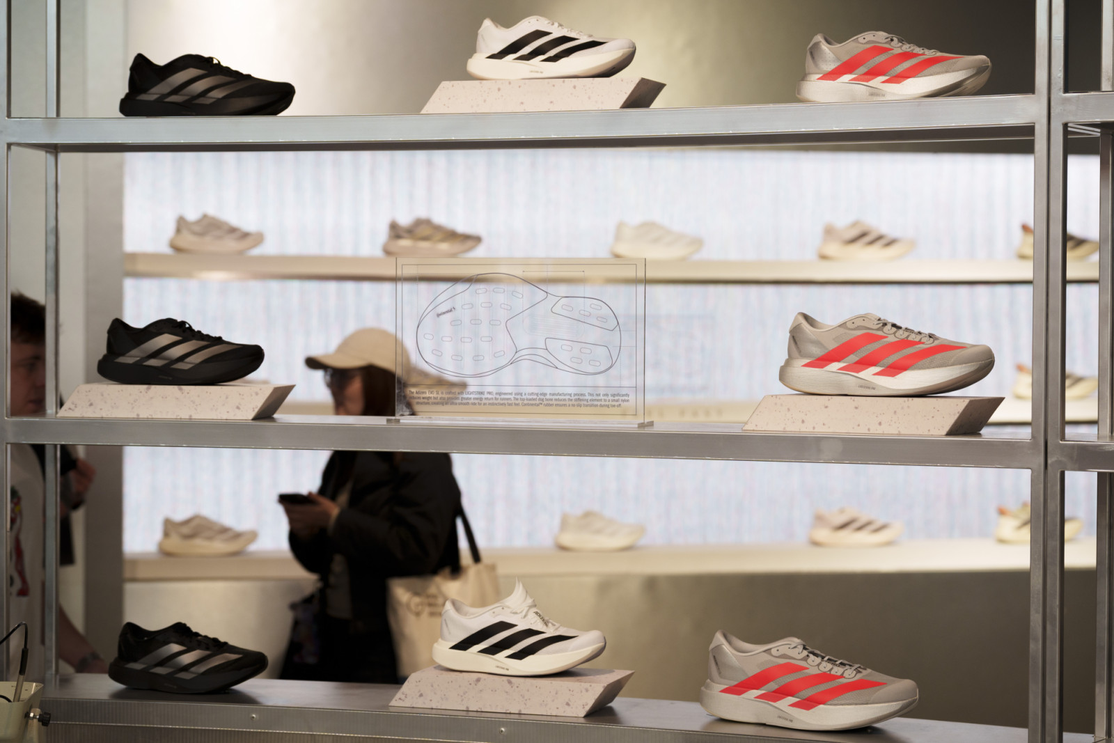 The morning after Kenyan runner Sabastian Sawe won the London Marathon with a world record time of 1:59.30, the first-ever sub-two-hour marathon in a competitive race, Adizero shoes are displayed at the Adidas store in London's Oxford Street, on 27th April 2026, in London, England. Sawe was the first to beat the iconic 2hr barrier but in second place, and also under two hours, came the Ethiopian Yomif Kejelcha in his forst ever marathon. Both wore the Adidas Adizero Adios Pro Evo 3 which weighs a little ove