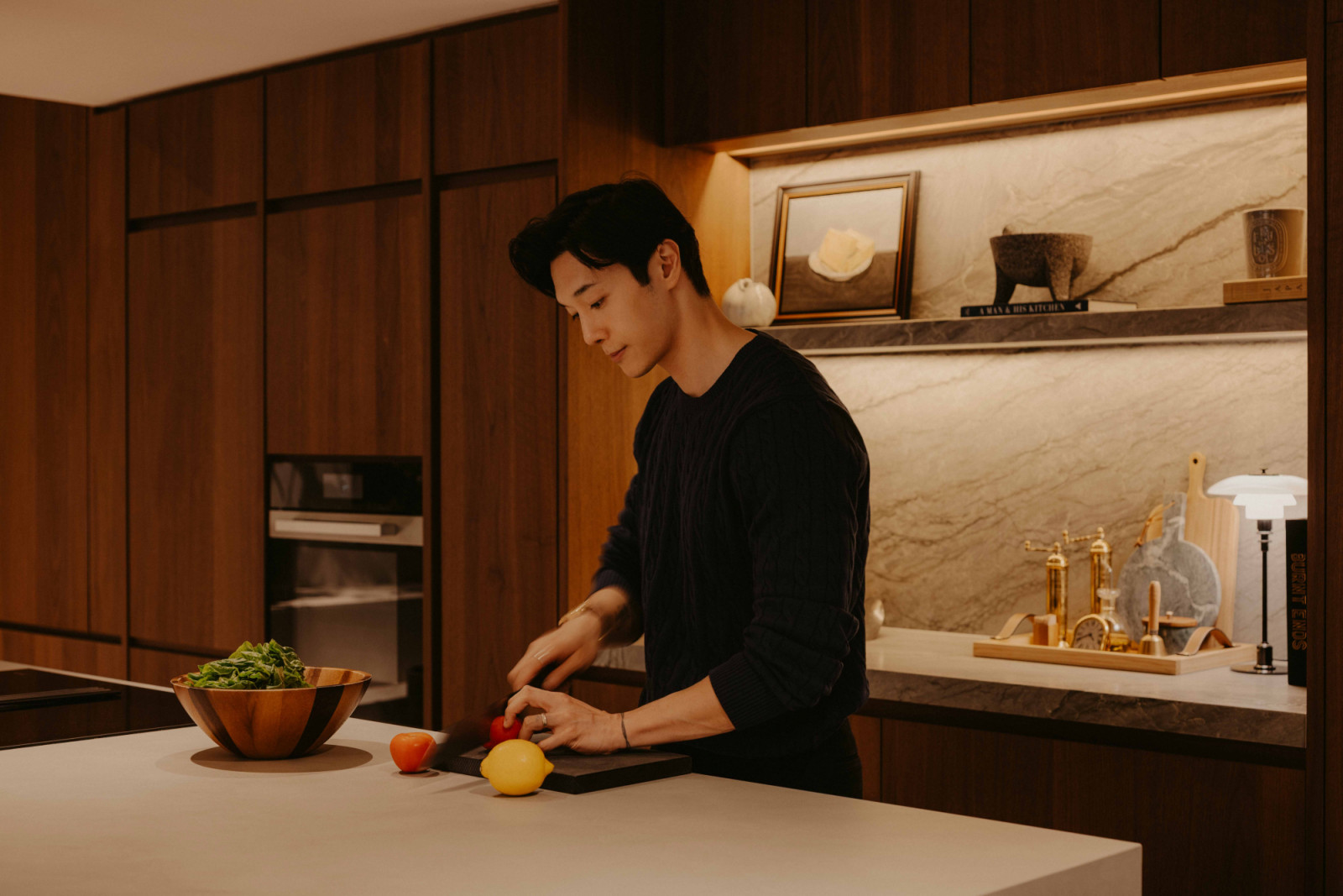 Lennard Yeong in the dry kitchen, where he films his cooking videos and treats the space as his working studio