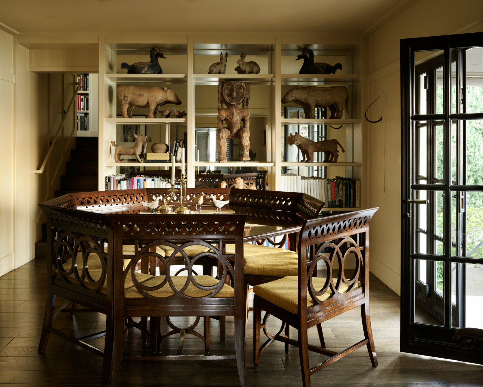 Wiseman’s avid display of objects ranging from crystals to pottery in the dining area