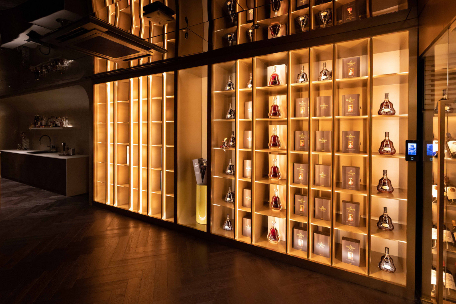 A display of liquours next to the bar area