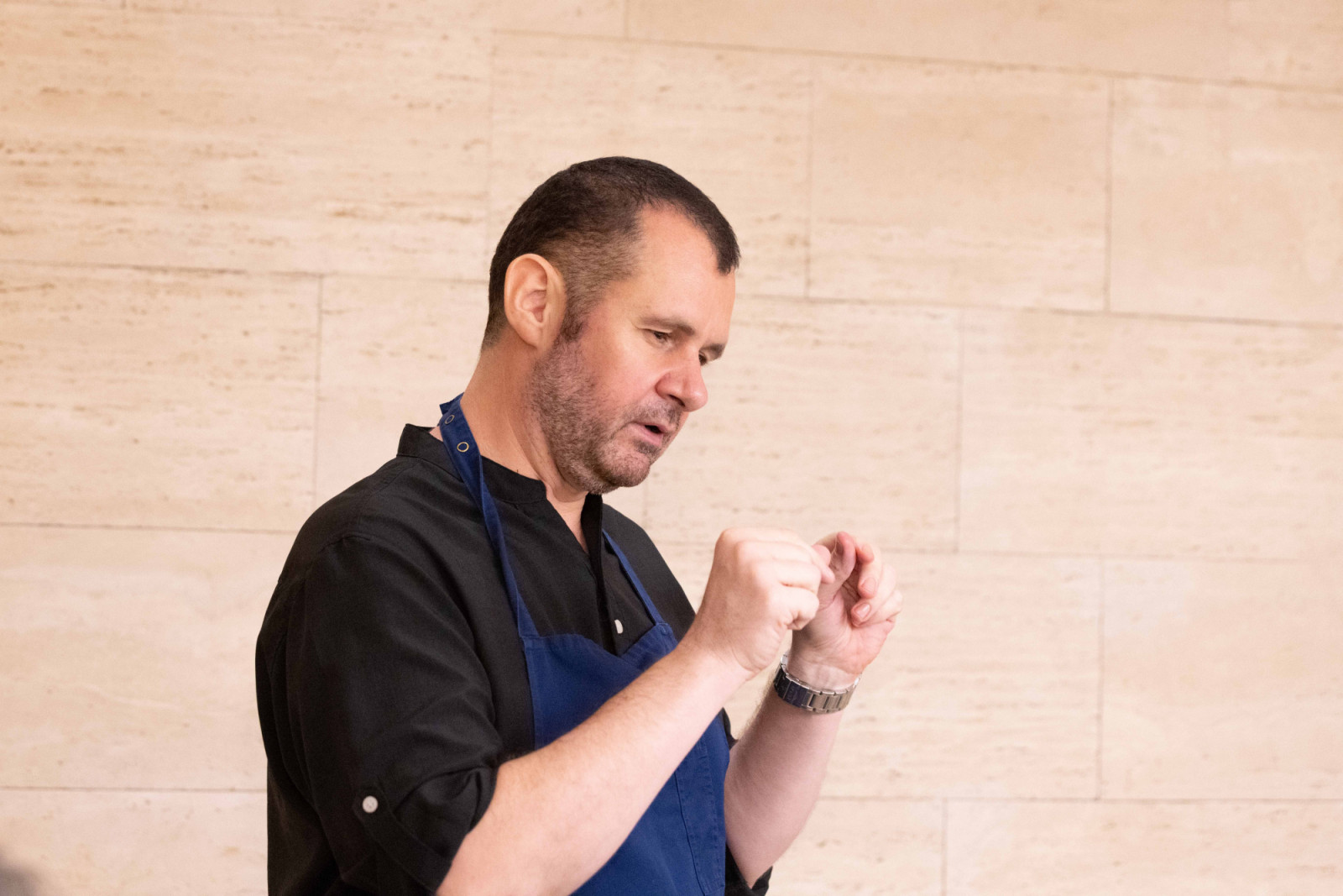 Chef Stephan Zoisl explaining the intricacies of a dish