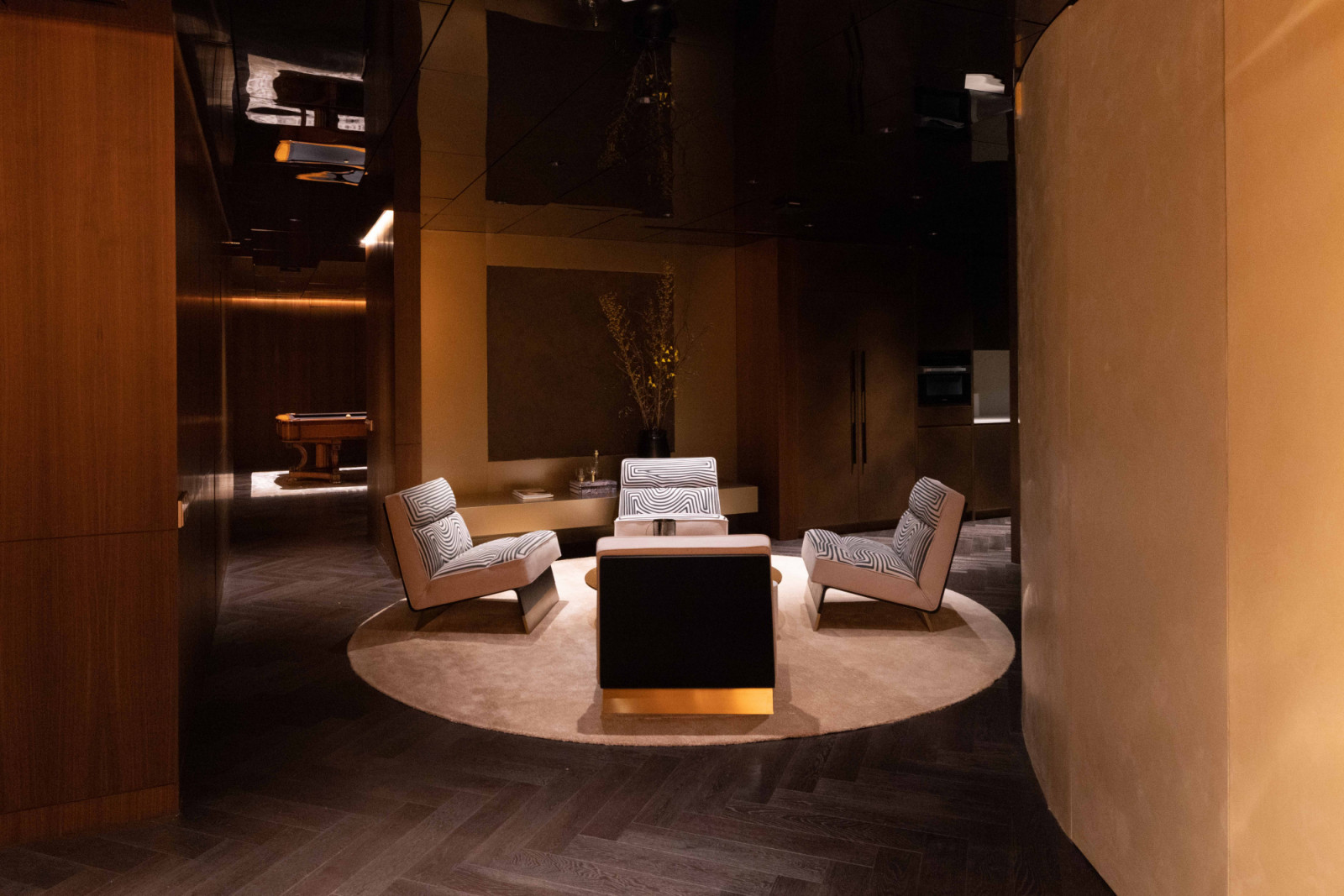 The basement features numerous lounging areas for guests