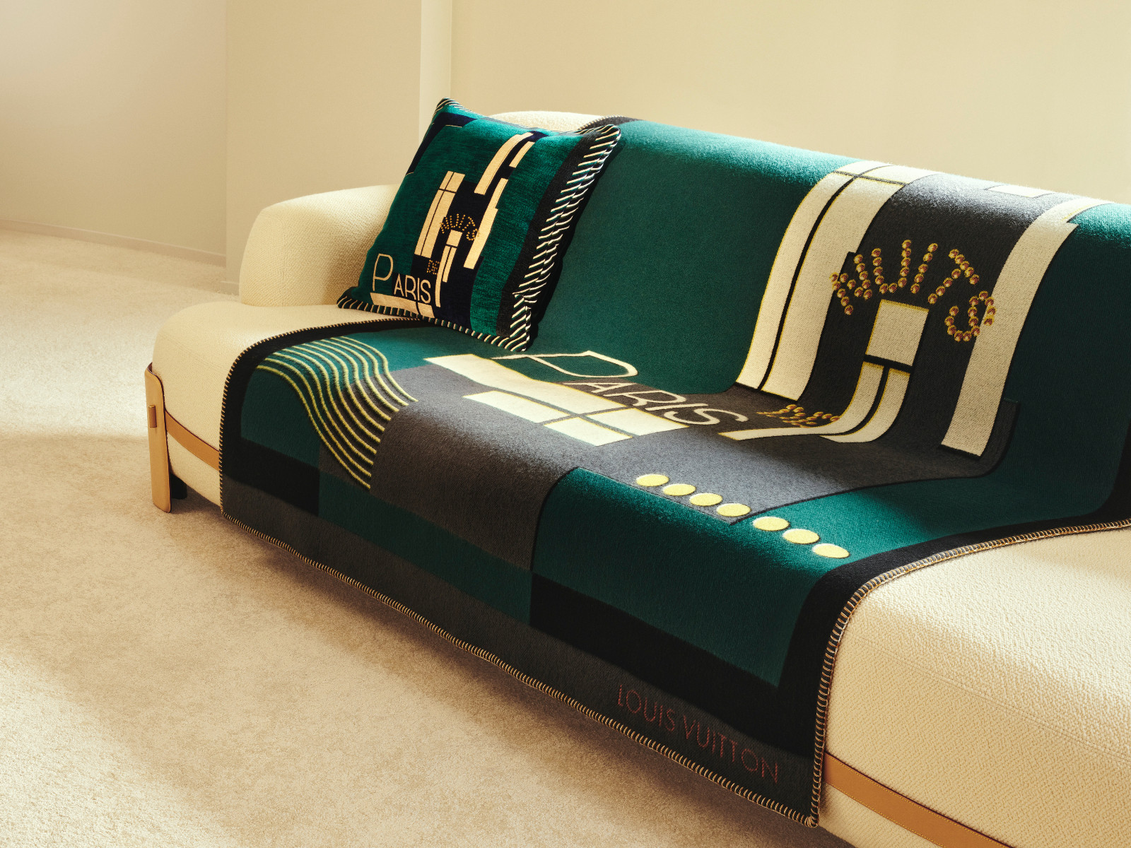 Throw blanket and pillow from Louis Vuitton’s Pierre Legrain Homage Collection