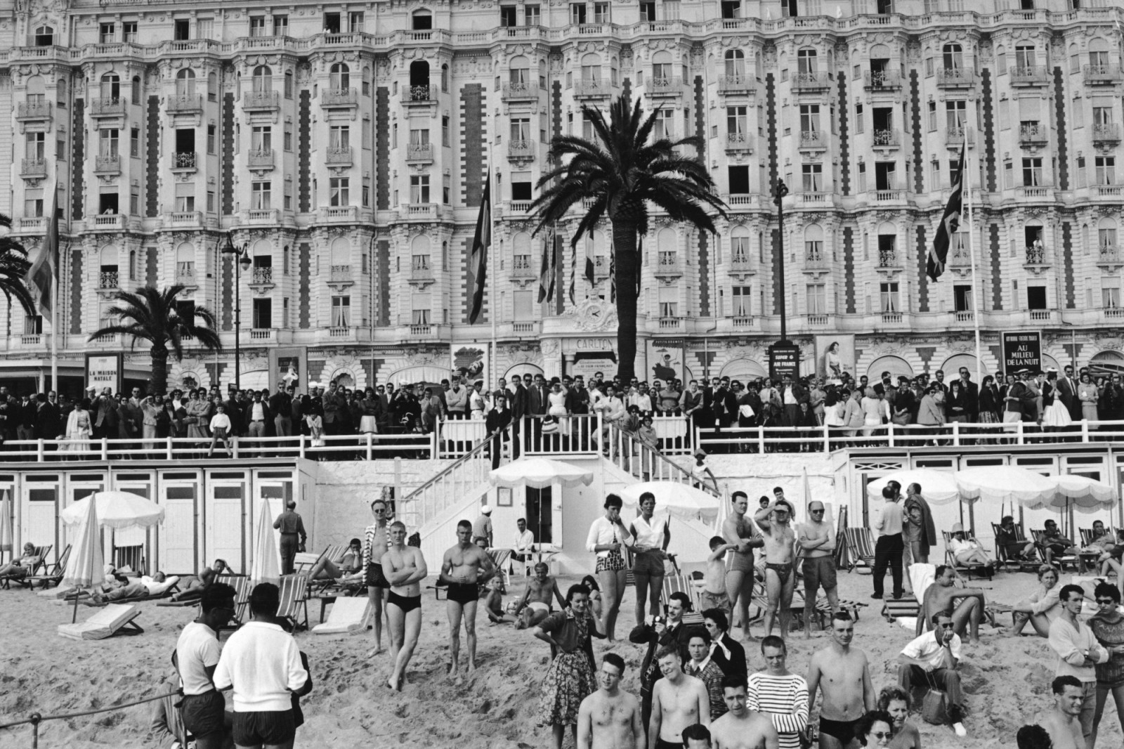 Fans on the seafront outside the Carlton Hotel waiting for film stars to arrive during the Cannes Film Festival, 3rd May 1959 (Photo: Keystone/Hulton Archive/Getty Images)