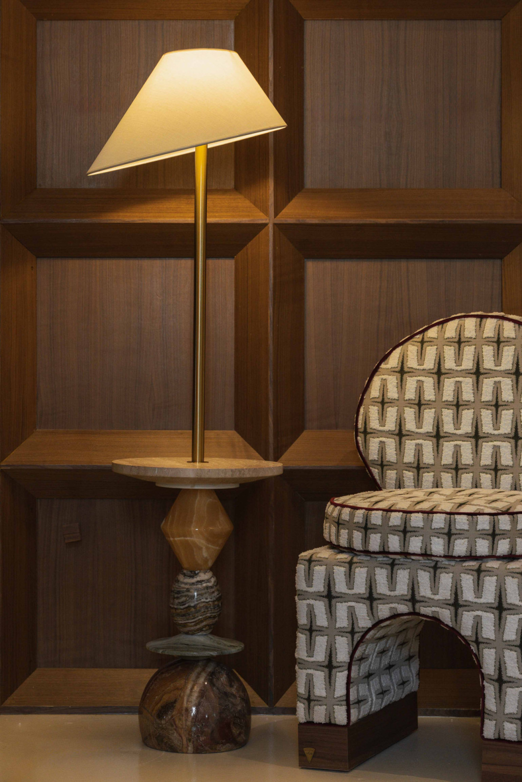 Stacked Sonata Lamp next to the Monologue Chair