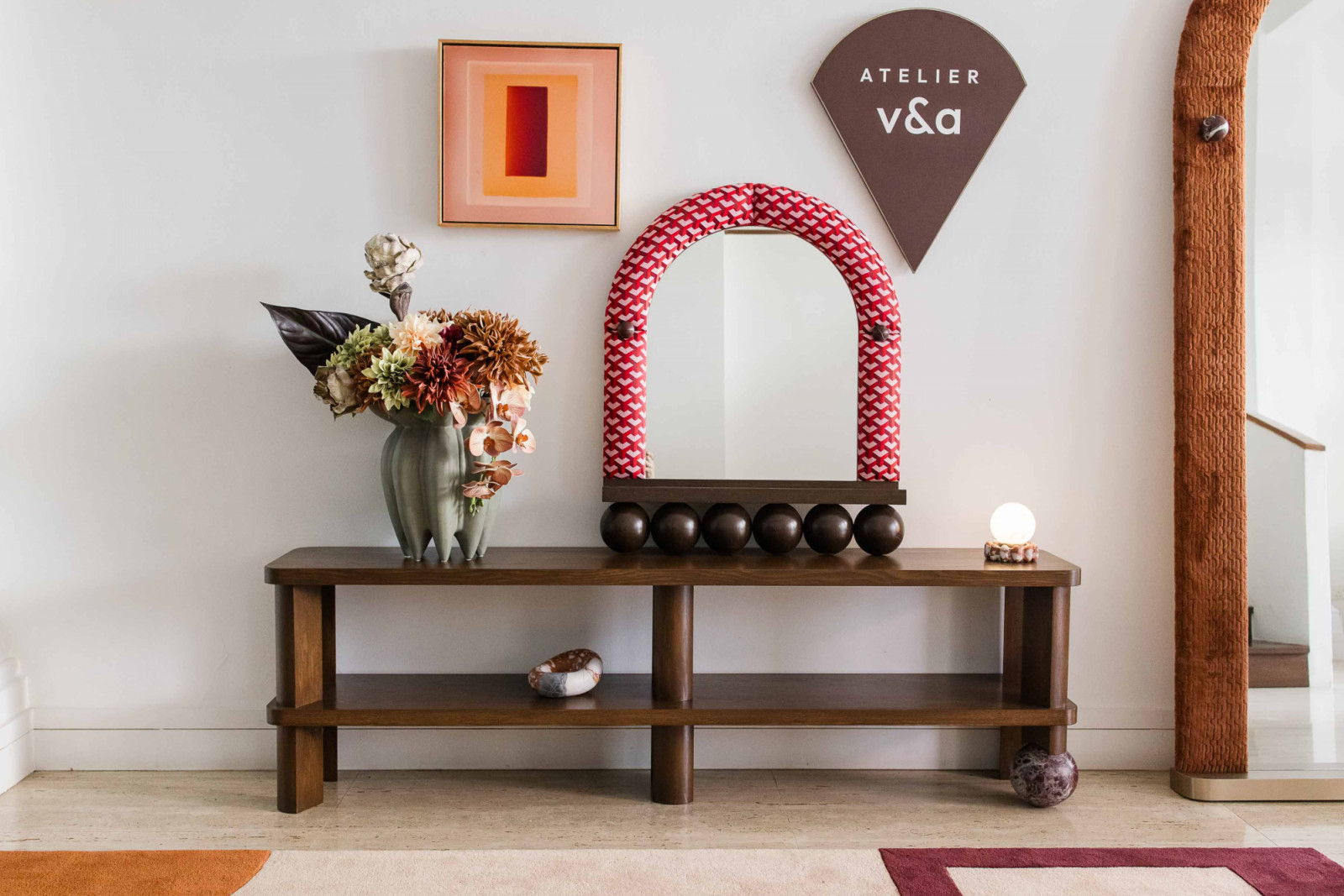 The Prologue Media Console and mini Intermission Mirror add a touch of fun to this area of the shophouse