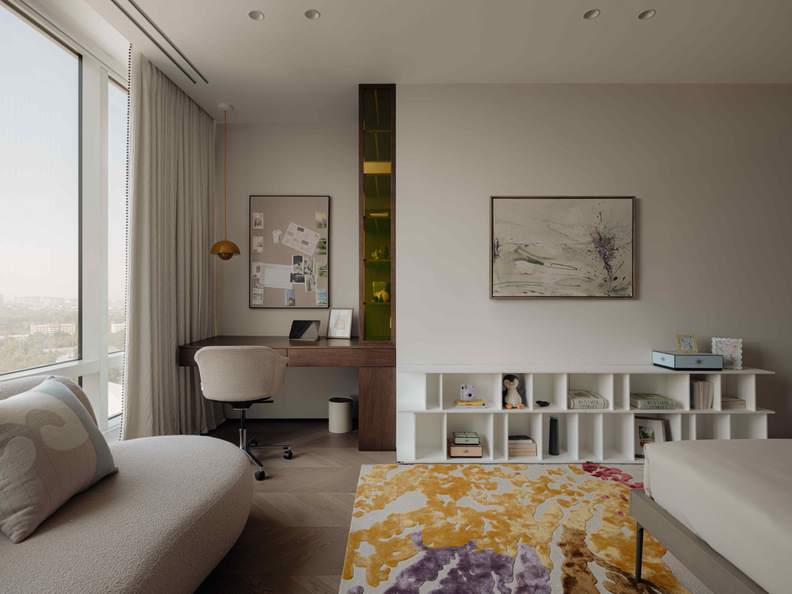 The girl’s bedroom, featuring a vibrant carpet by Sitap