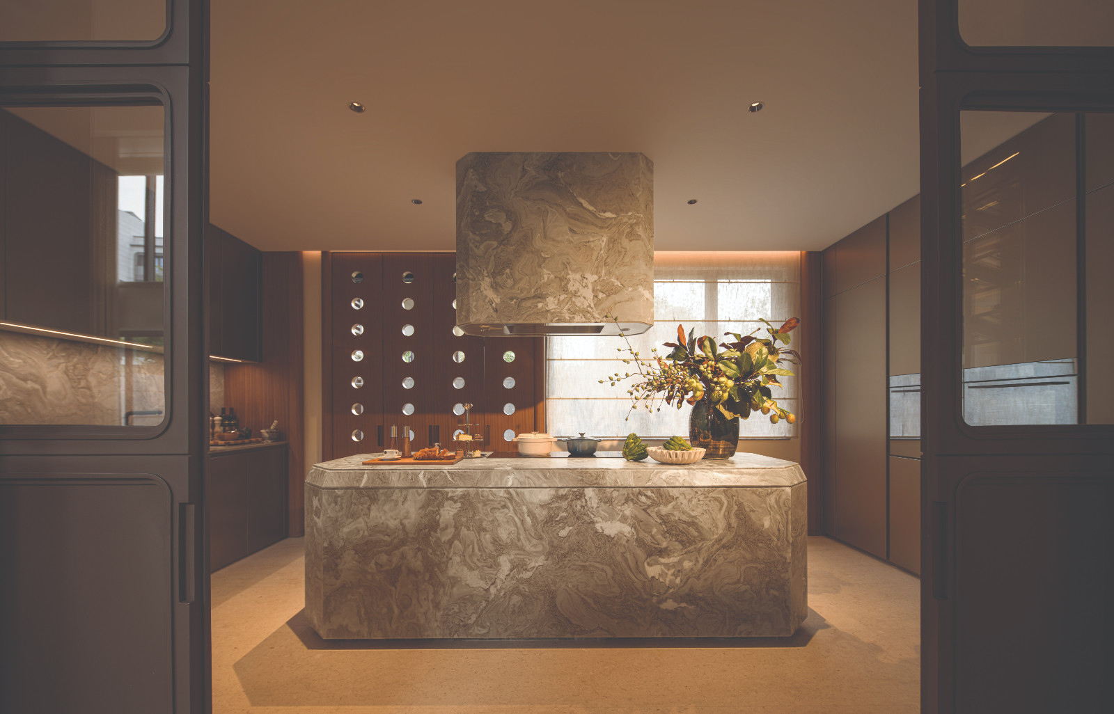 The a striking kitchen island clad in rare Cipollino marble. (Photo: courtesy of NC Design + Architecture)