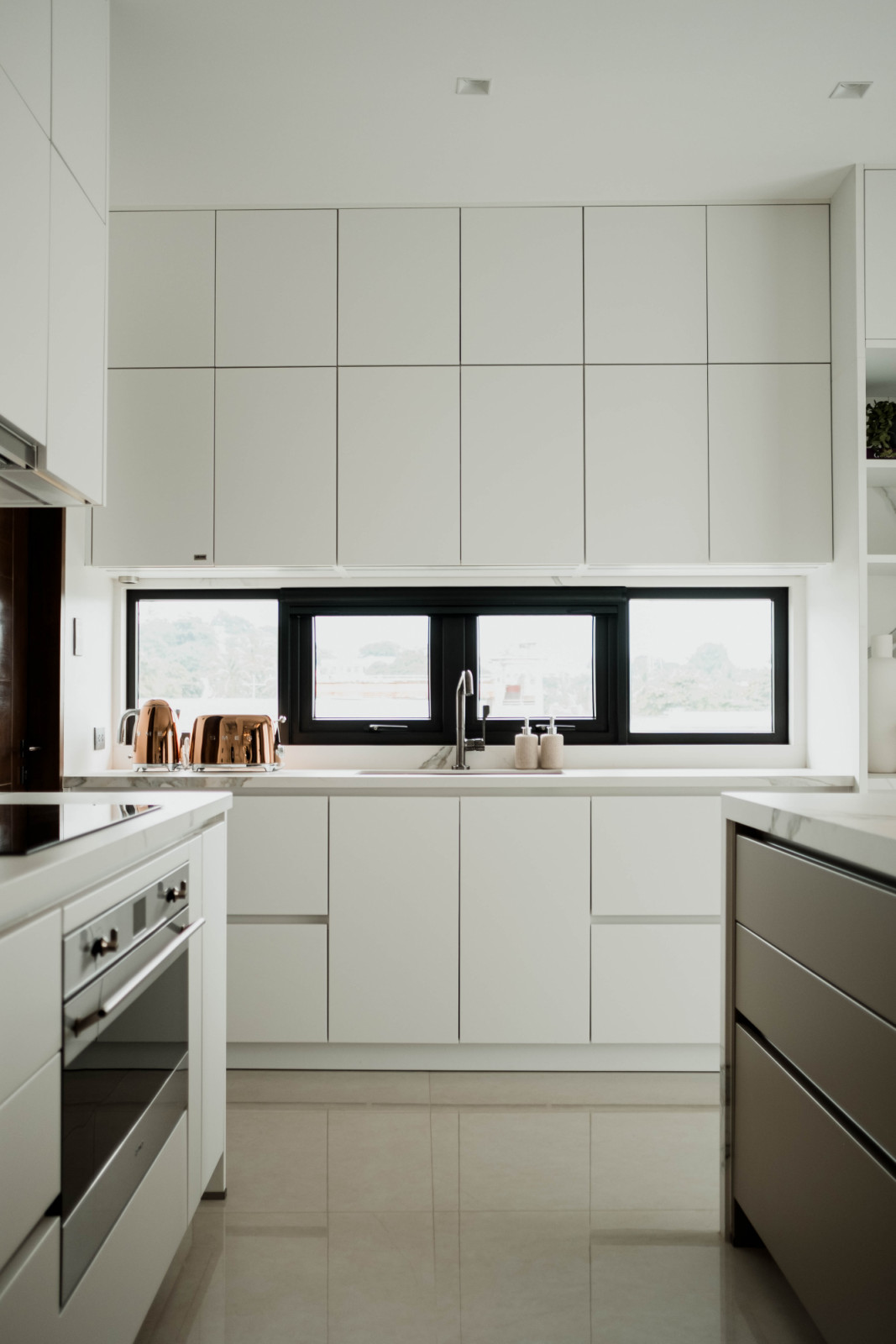 The kitchen in a multigenerational family home in Estancia, Iloilo designed by Isabella Robles-Go of Living Innovations Design Unlimited
