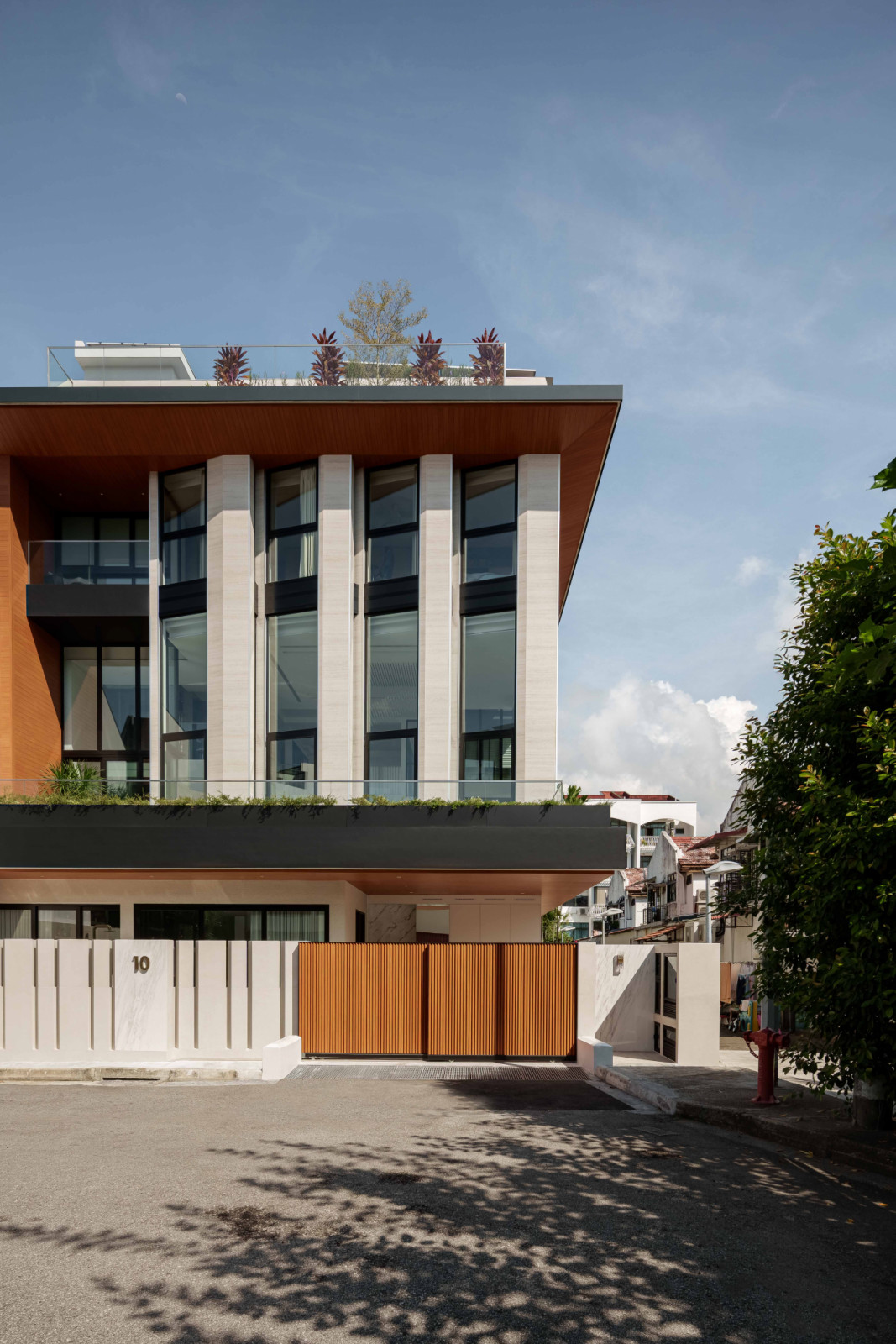 The facade of this two-storey multigenerational home transformed by Create Architecture