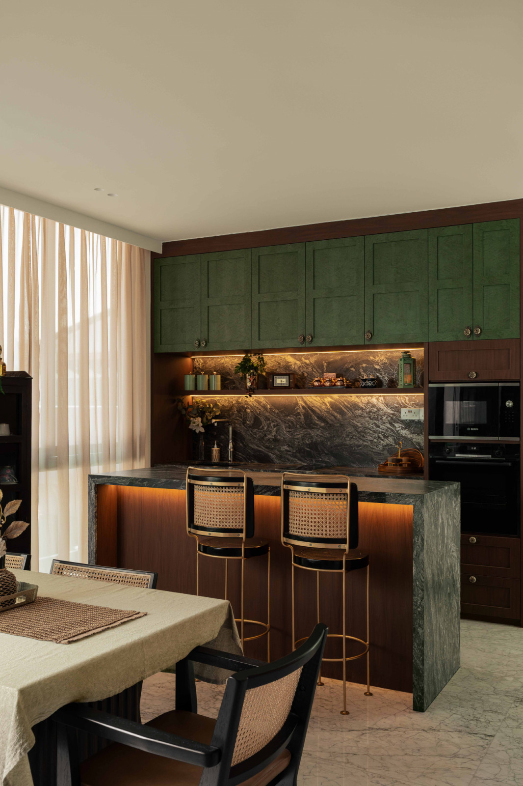 The Peranakan-inspired dry kitchen subtly calls back to the design of the original kampung home
