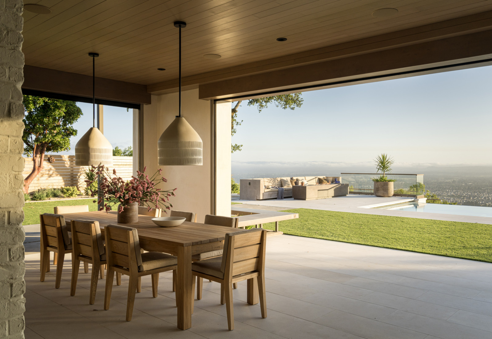 The outdoor dining room of a family home designed by Kimberly Oxford Interiors in Santa Rosa, California