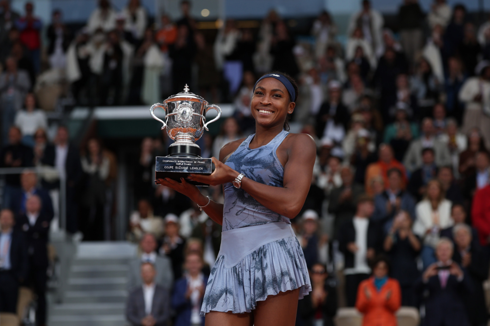 Prizegiving ceremony with Coco Gauff (USA) holding the trophy after her win in her final round women's singles match against Aryna Sabalenka (Blr) on day fourteen at Roland-Garros
